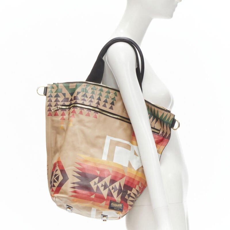 rare SACAI PENDLETON aztec ethnic print brown leather foldover tote bag
Reference: ANWU/A00008
Brand: Sacai
Designer: Chitose Abe
Model: Foldover
Collection: Pendleton
Material: Leather
Color: Multicolour
Pattern: Geometric
Closure: Zip
Lining: 