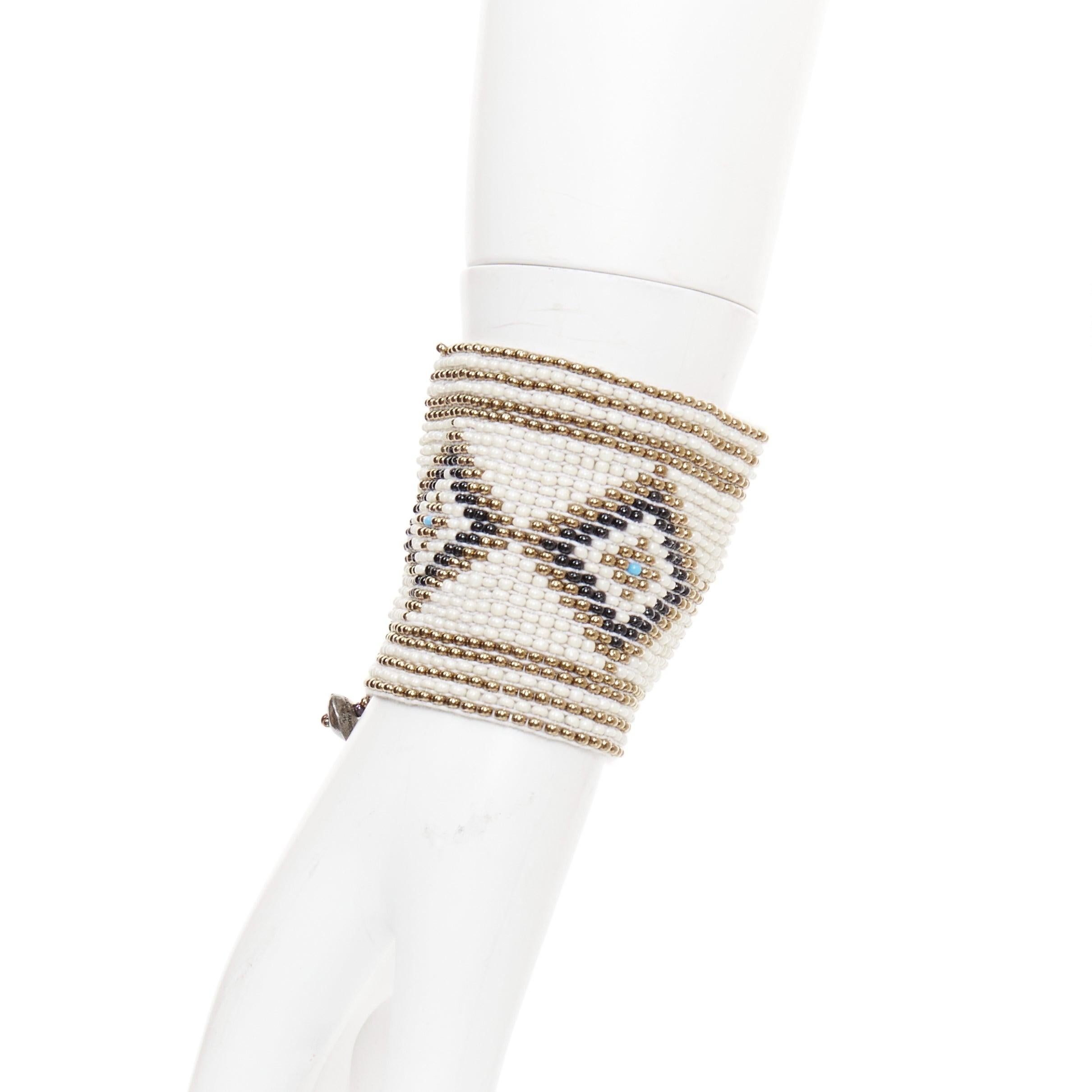 rare SAINT LAURENT Hedi Slimane Hippie Miyuki ethnic bead elastic cuff bracelet Pour hommes en vente