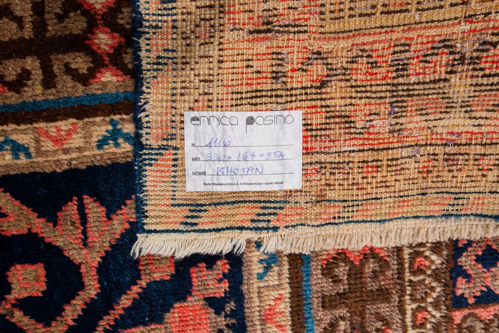 1116. Old Khotan or Samarkanda carpet with rare red 