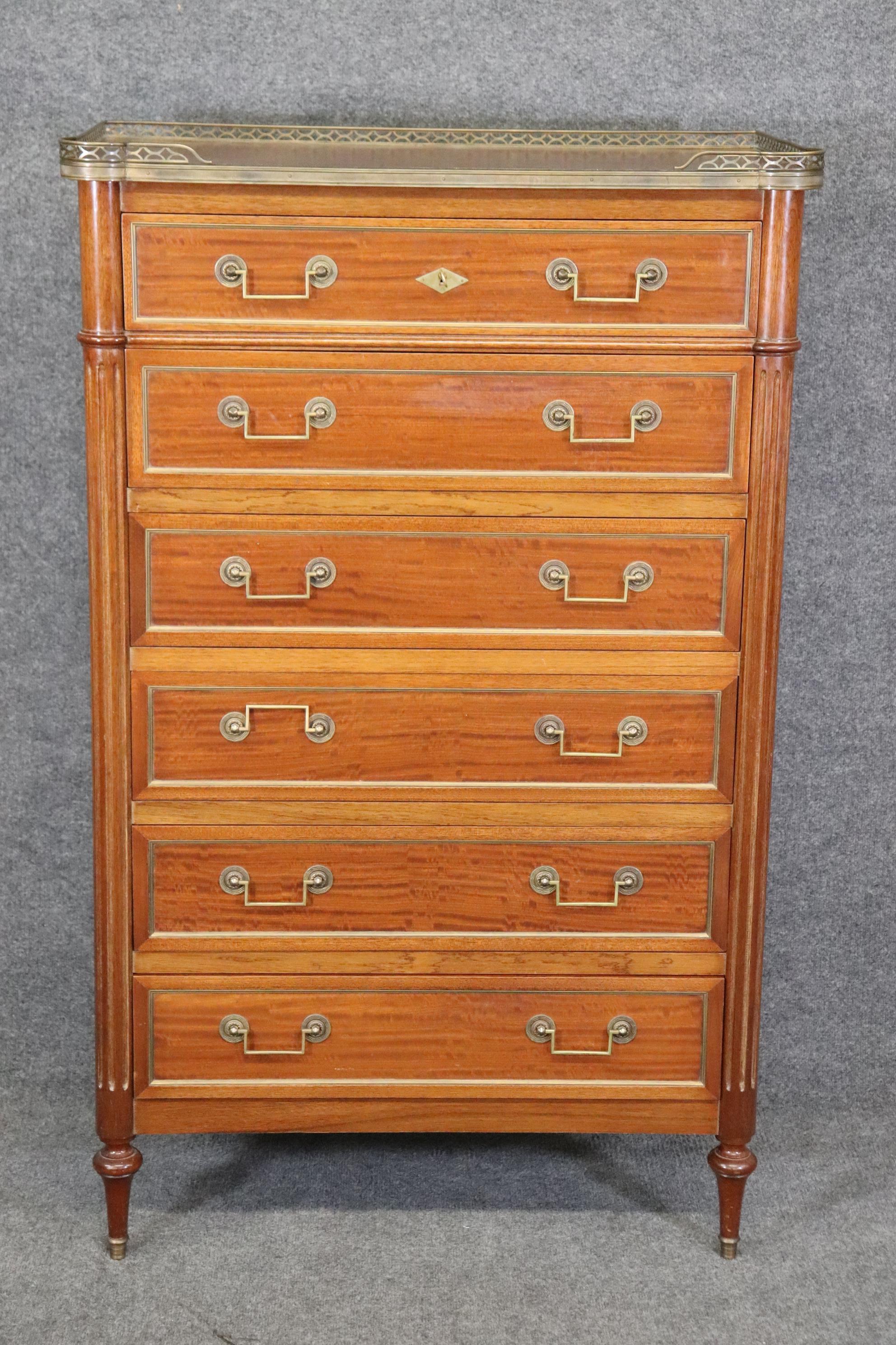 These don't normally have satinwood cases! They are usually walnut or cherry, but rarely satinwood. The brass trim and gallery are top quality as is the original hardware, case and finish. The dresser features 6 drawers and fantastic wood quality