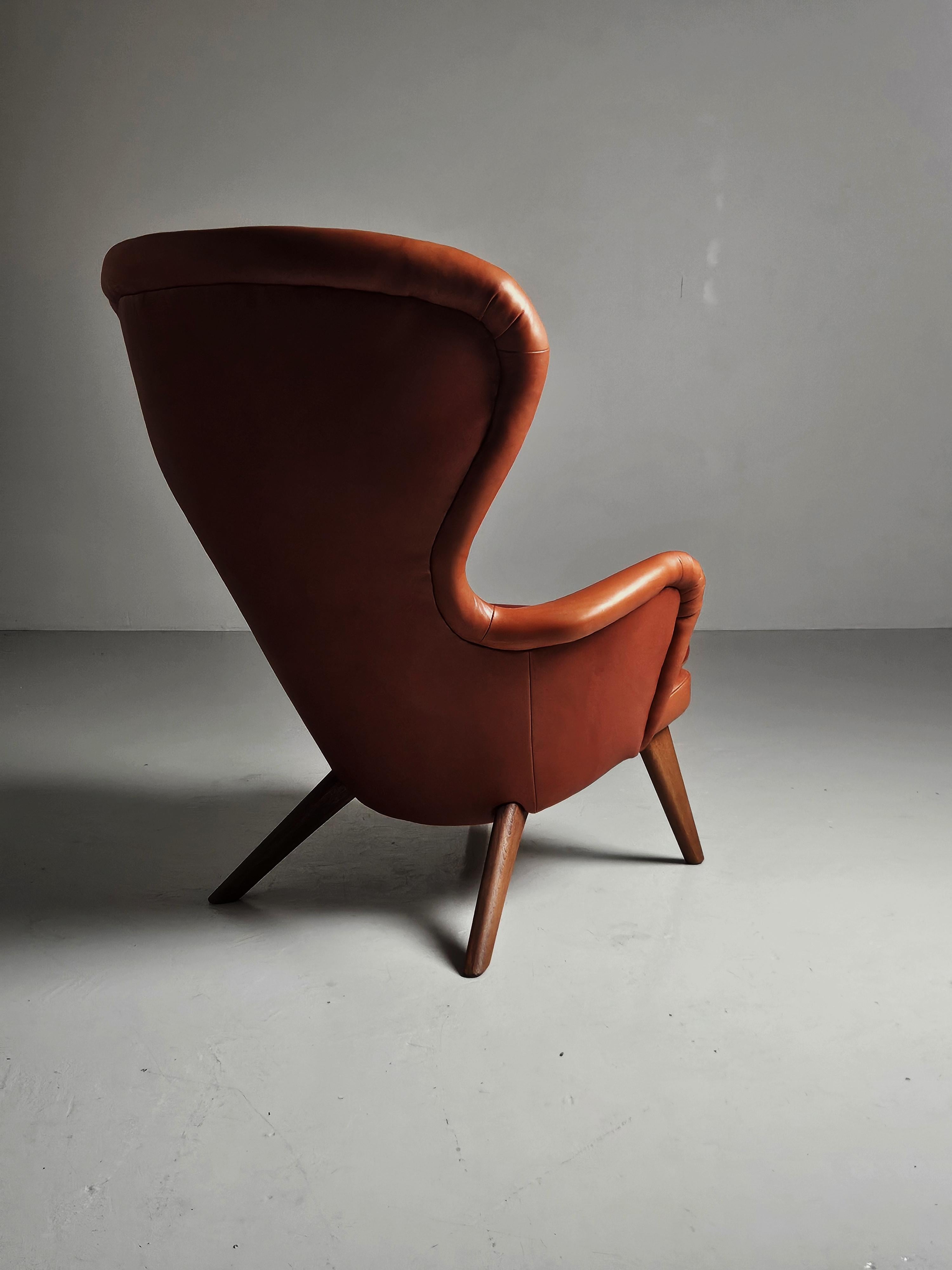 Finnish Rare Scandinavian lounge chair 'Siesta' by Gustaf Hiort af Ornäs, Finland, 1950s For Sale