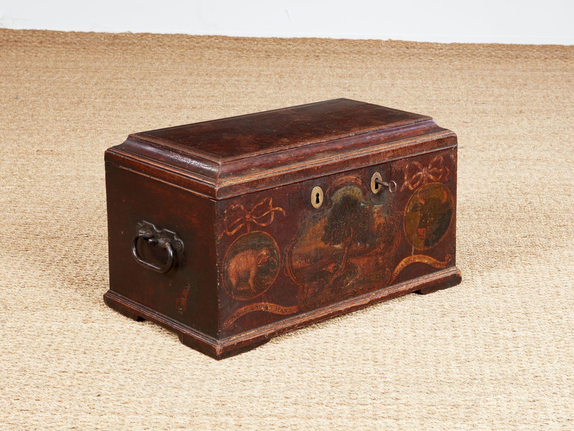 Rare Scottish George III corporation treasury box, dated 1772, of caddy form, the lid with cove molded edge, the front with polychrome decoration commemorating the Edinburgh Corporation of Comb Makers, with the company motto 