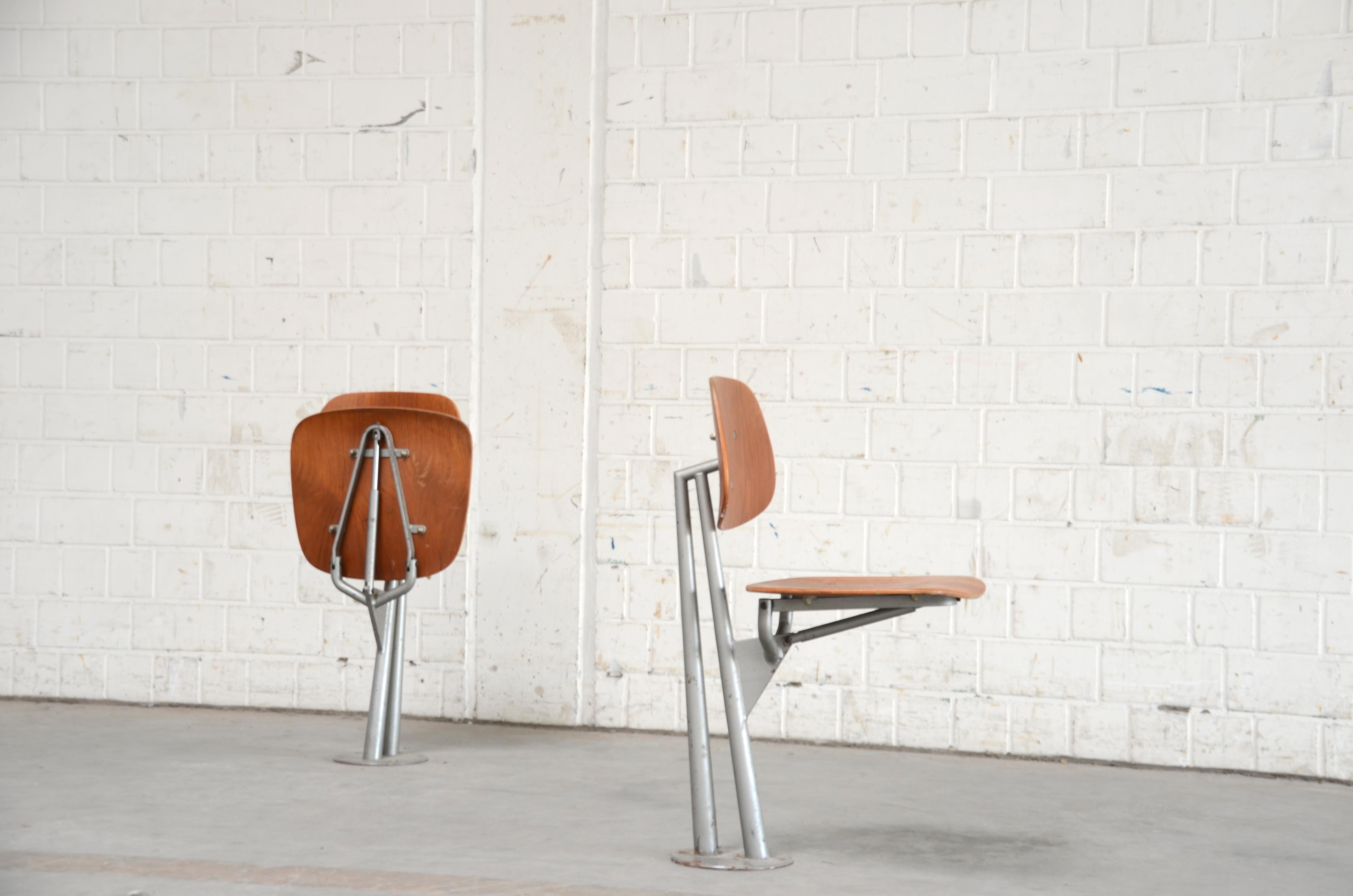 Rare Sculptural Industrial Teak Folding Chairs 12