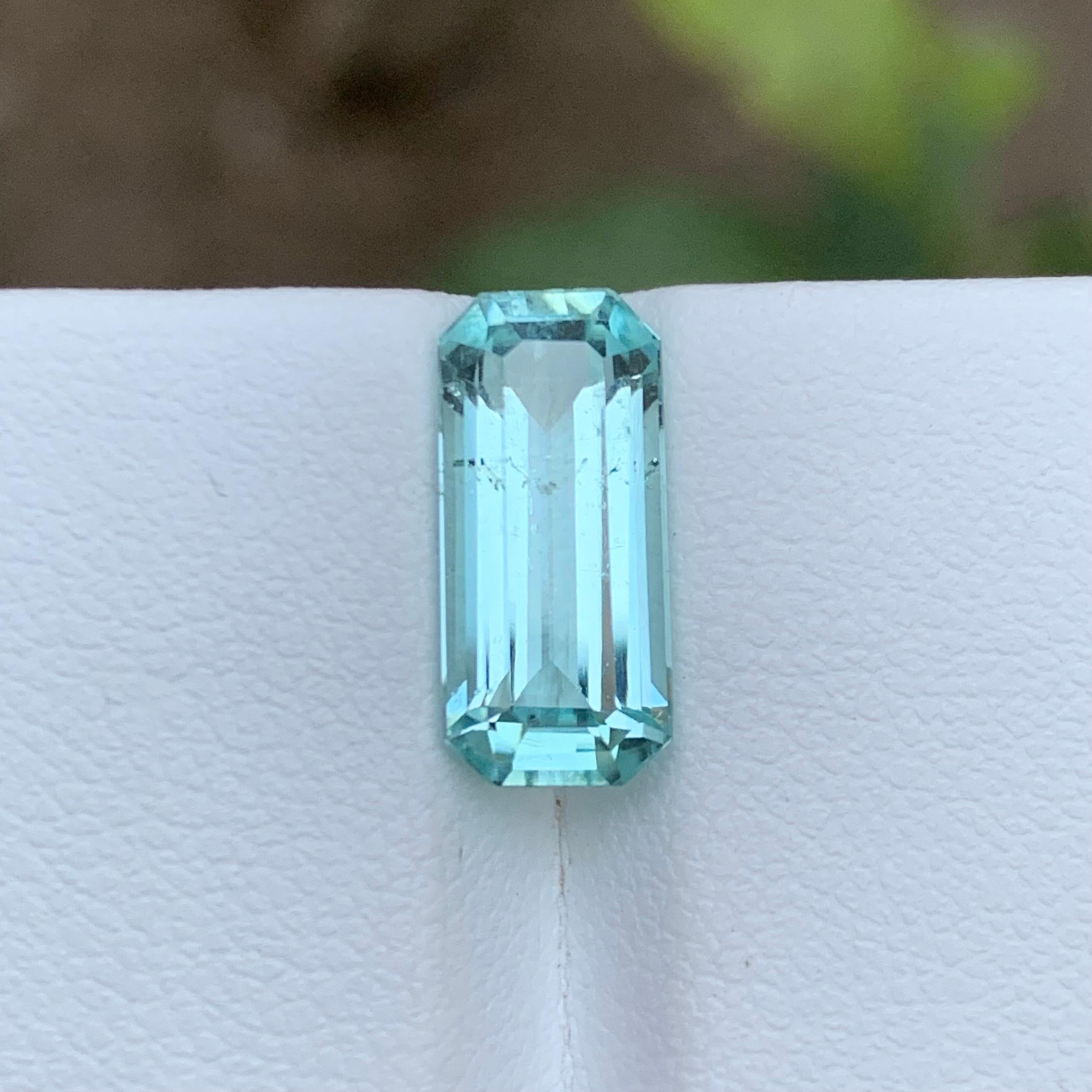 GEMSTONE TYPE: Tourmaline
PIECE(S): 1
WEIGHT: 3.65 Carats
SHAPE: Emerald Cut
SIZE (MM): 13.82 x 6.31 x 4.97
COLOR: Seafoam
CLARITY: Slightly Included 
TREATMENT: None
ORIGIN: Afghanistan
CERTIFICATE: On demand

Elevate your jewelry collection with