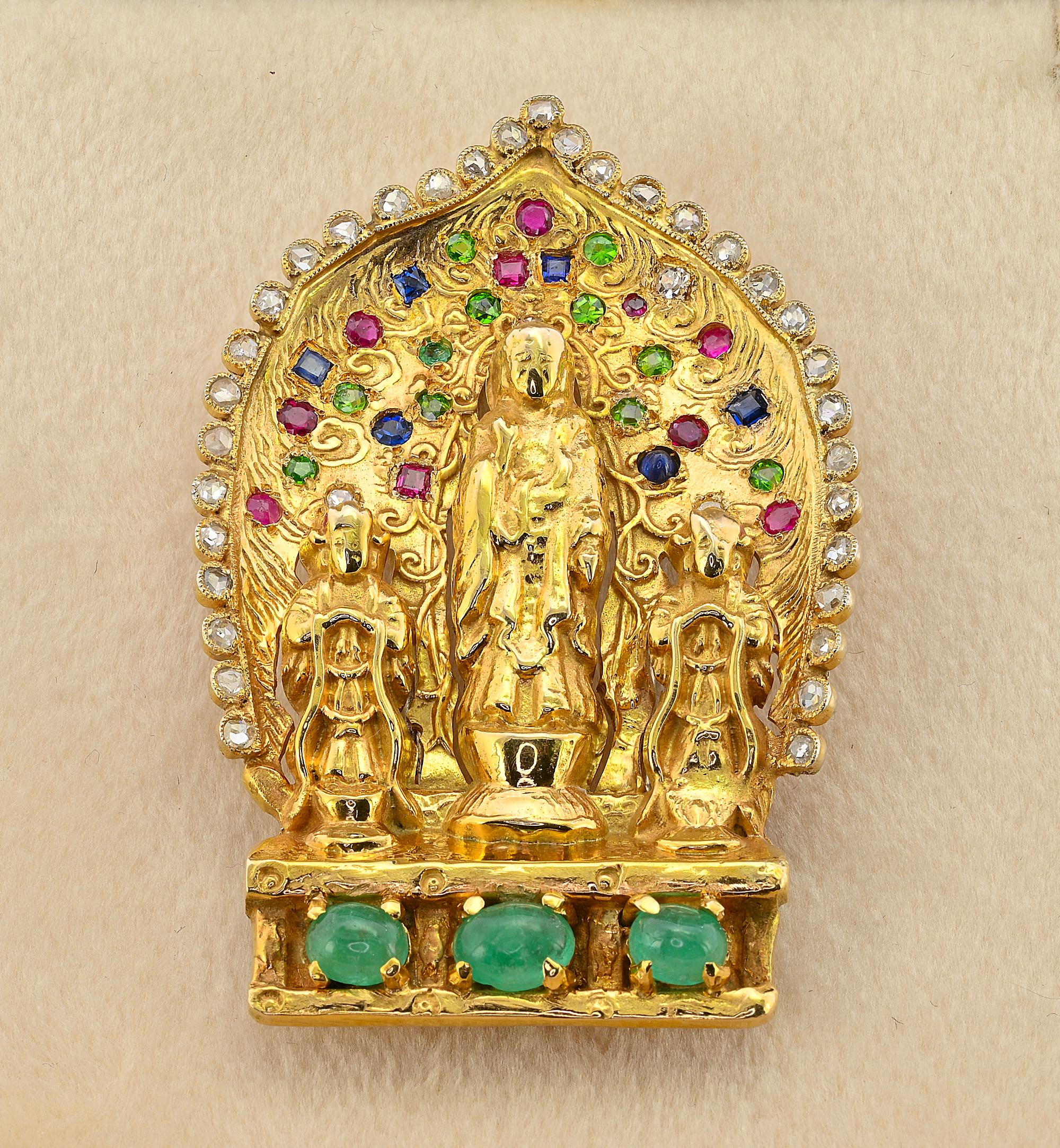 A stunning vintage brooch 1940 circa, signed Seaman Schepps
Rare example of the early Seaman Schepps jewelry, hand crafted of solid 18 Kt
Amazingly modeled as an Indian Divinity temple, the God standing between two monks with colored gem-set