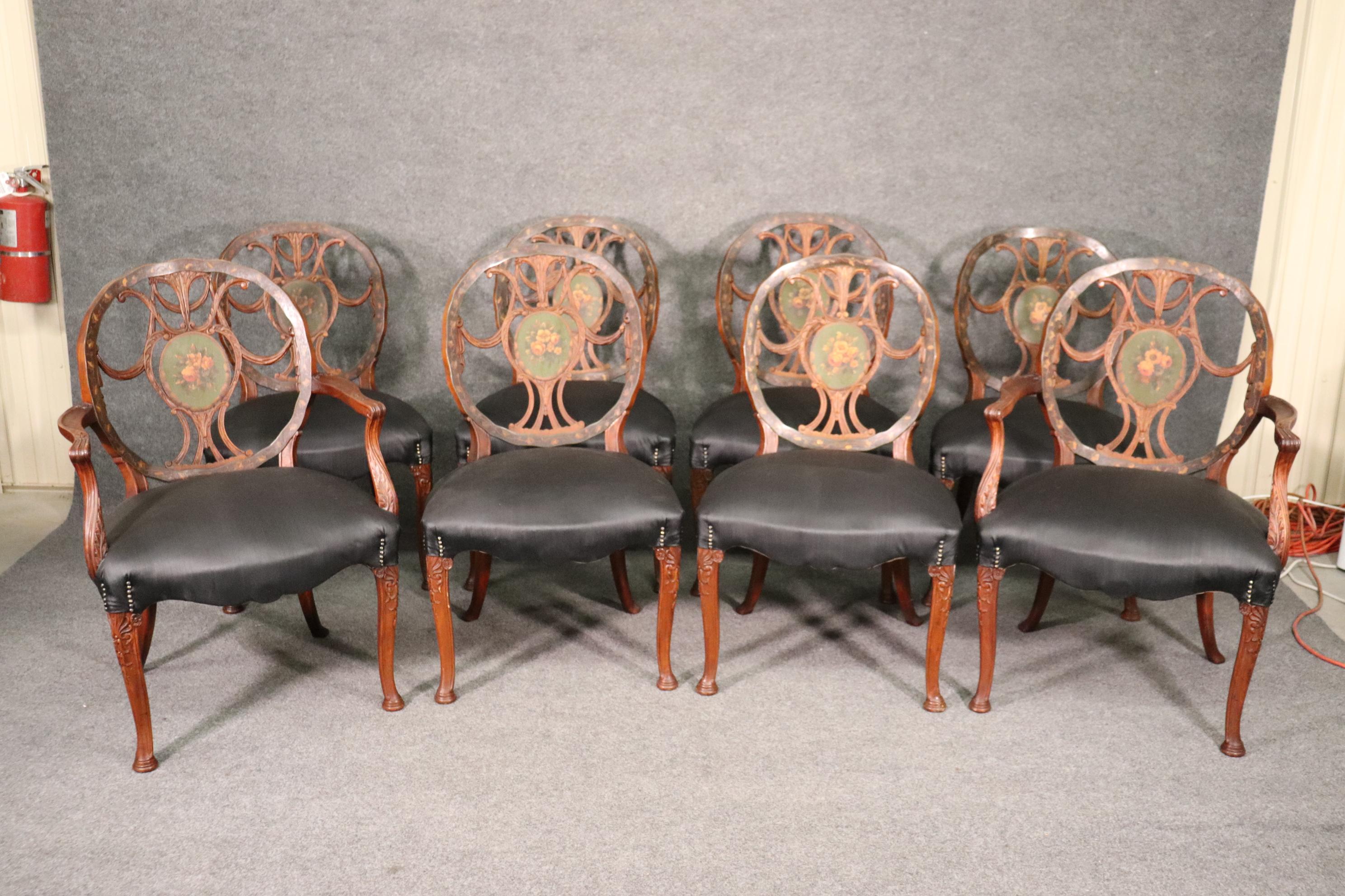 This is a very rare and desirable set of Adams dining chairs. The chairs feature their original finish and has that crazed crackled finish and their original waxed canvas upholstery. These chairs are in good antique condition and have no issues