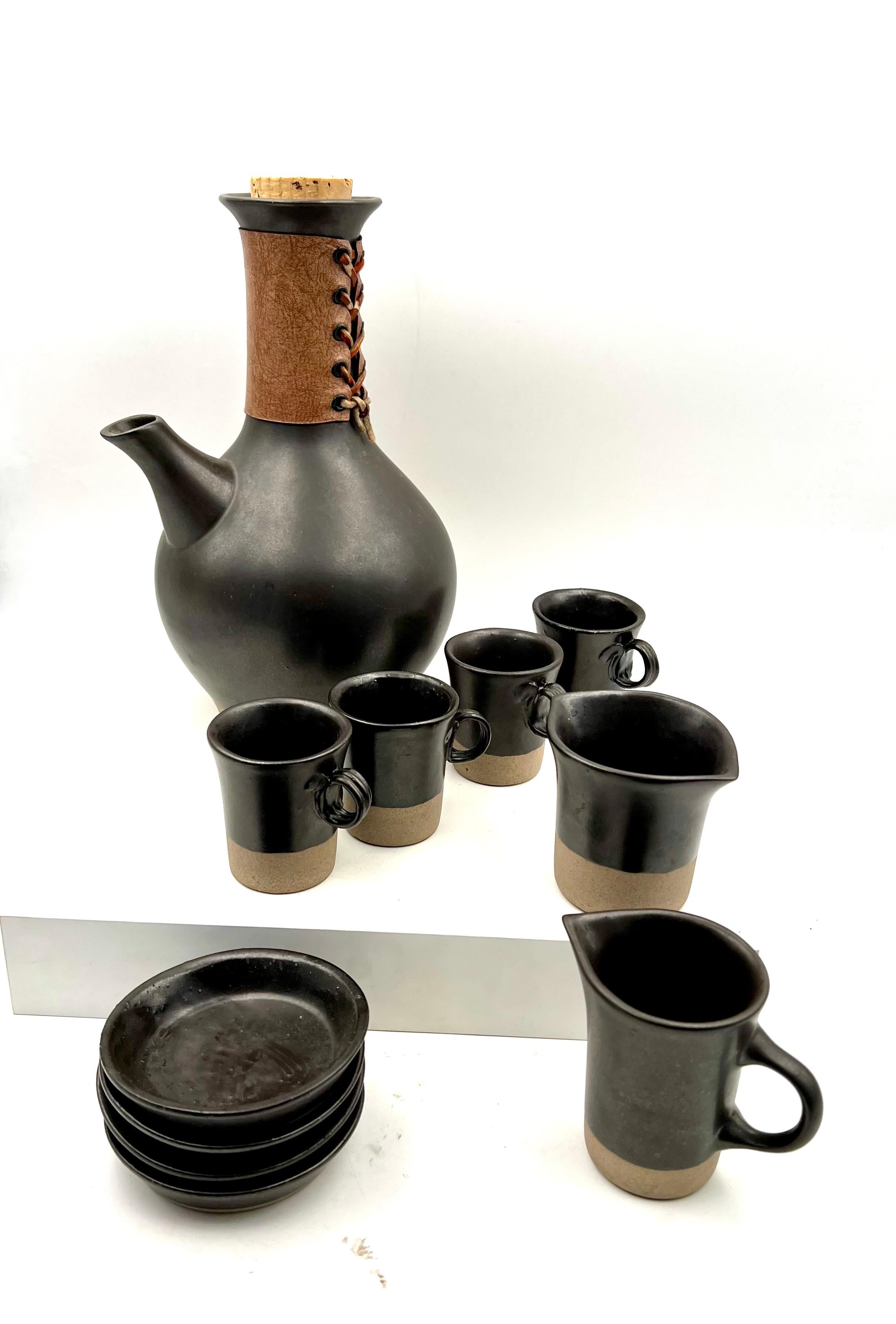 An incredible and rare set by Gordon Martz for Marshall studios each piece is signed and comes with 4 espresso cups, 4 small plates a sugar, and a creamer, nice condition no chips or cracks, nice and hard set to find.