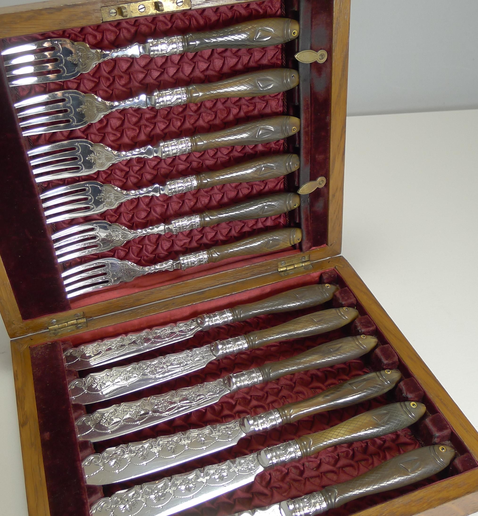 Seltene Set Fischmesser und Gabeln, figurale geschnitzte Griffe mit Glasaugen, 1909 im Angebot 4