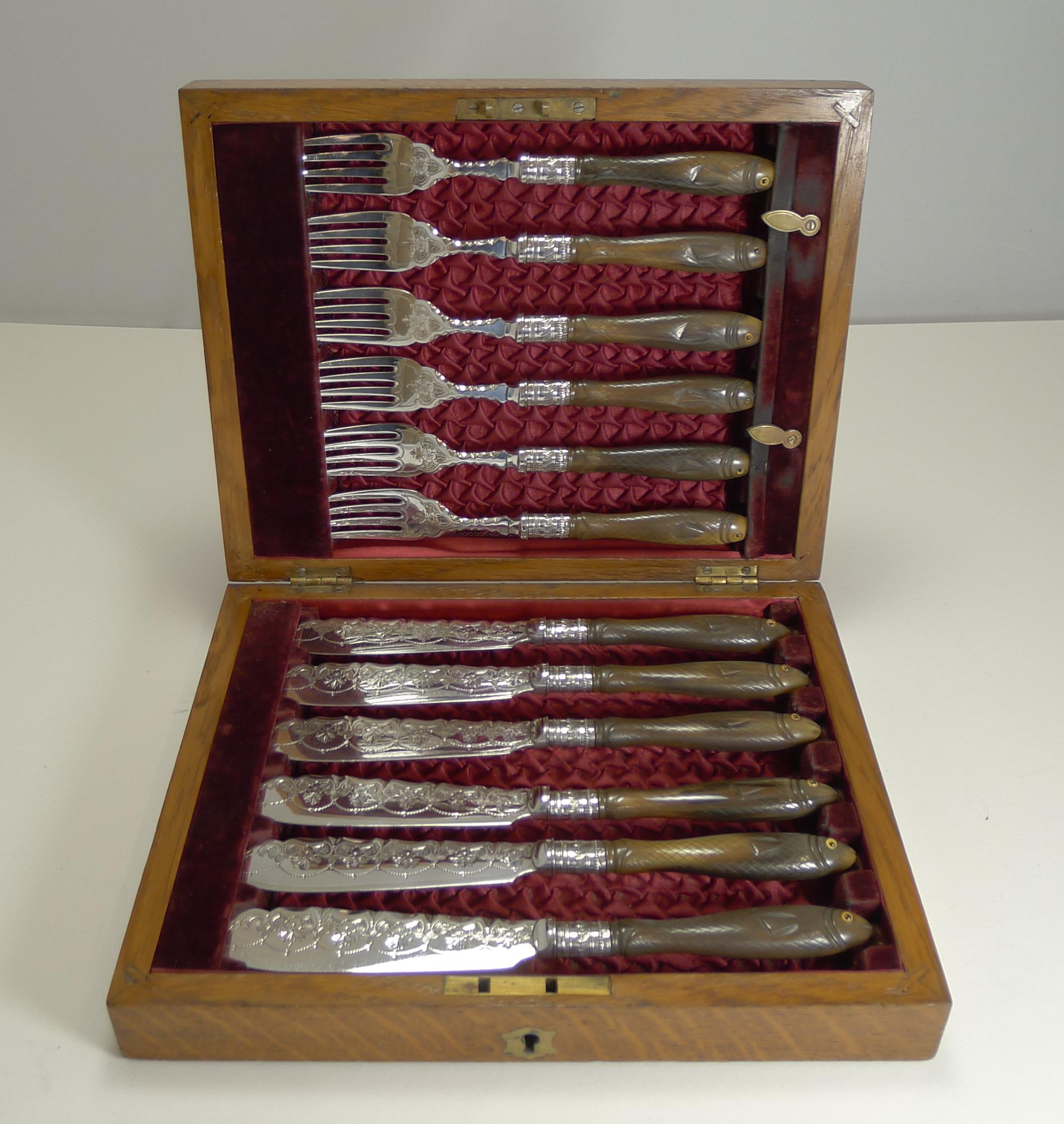 Rare Set Fish Knives and Forks, Figural Carved Handles with Glass Eyes, 1909 In Good Condition For Sale In Bath, GB