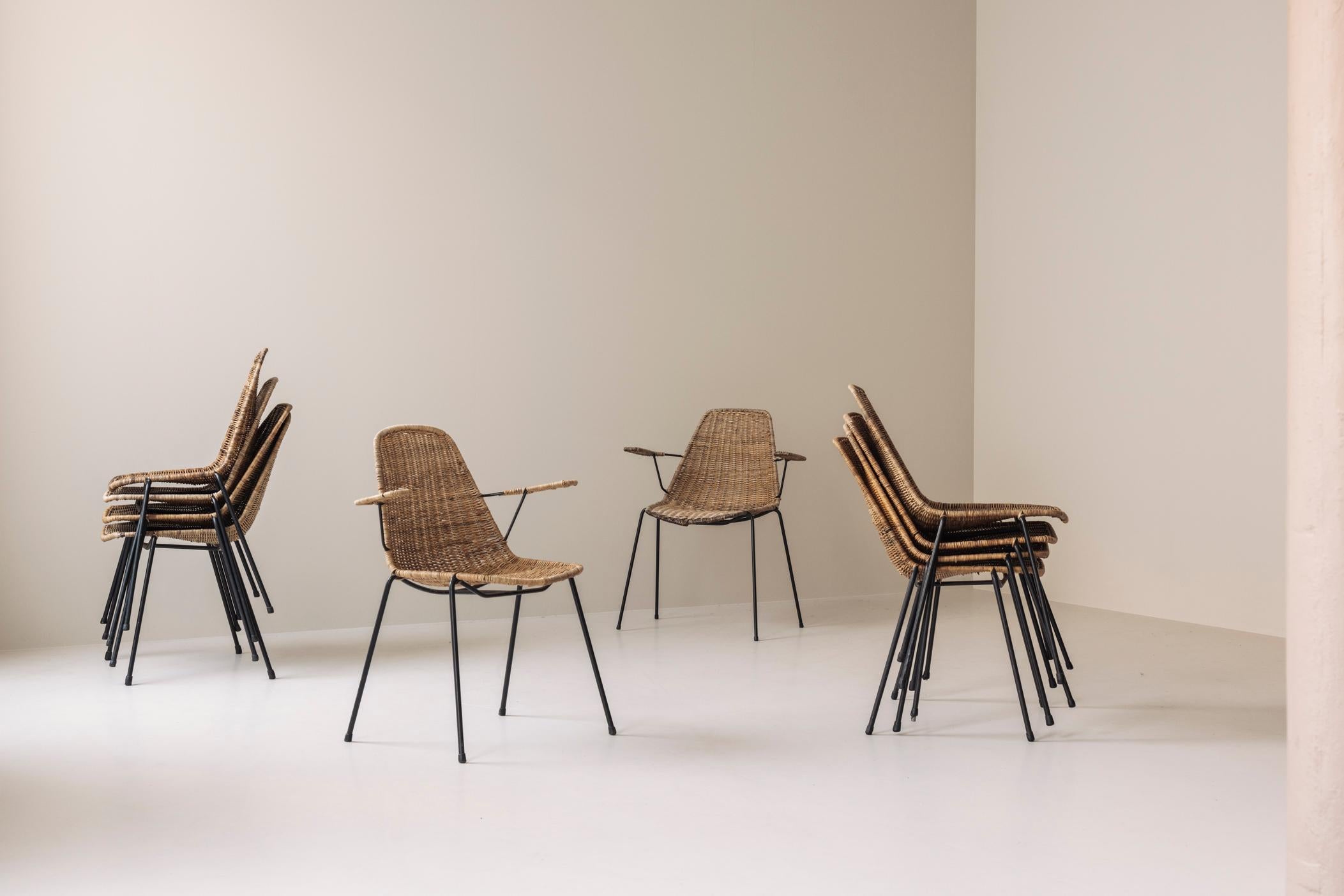 Rare set of 10 dining chairs by Gian Franco Legler, designed and manufactured in Italy during the 1950s. These chairs are a rare find, embodying the timeless elegance and craftsmanship of mid-century modern design. Featuring a perfect blend of form