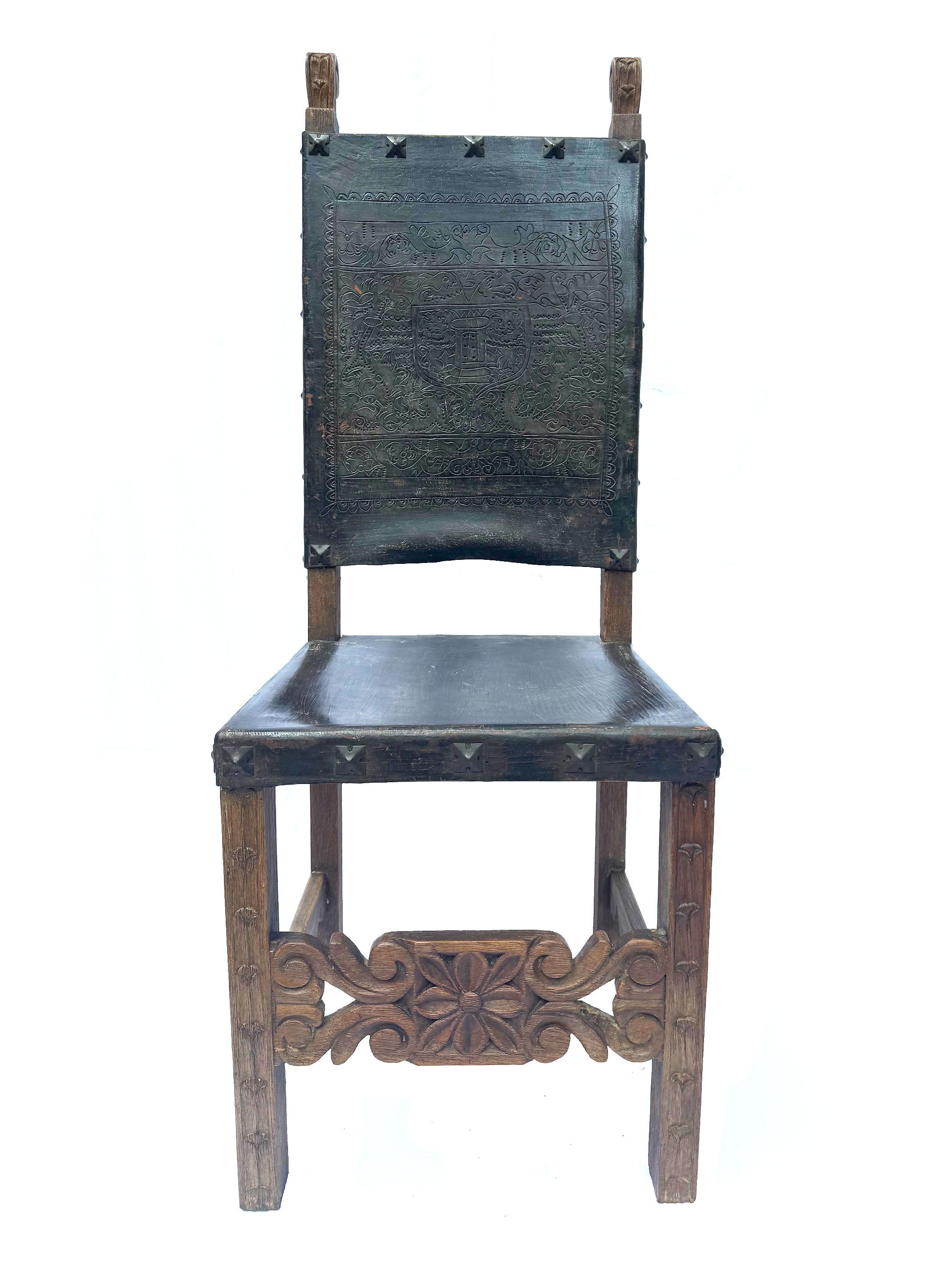 This exquisite set of 10 Peruvian Spanish Colonial Revival chairs, crafted around 1930, is a fine representation of early 20th-century craftsmanship that draws from the rich Spanish colonial heritage. The chairs feature hand-carved wooden frames,