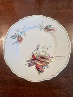 Lot de 12 assiettes à dîner Havilland- Limoges, six poissons et motifs cruciaux