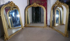 Rare ensemble de 3 grands miroirs de cheminée rococo cintrés et dorés