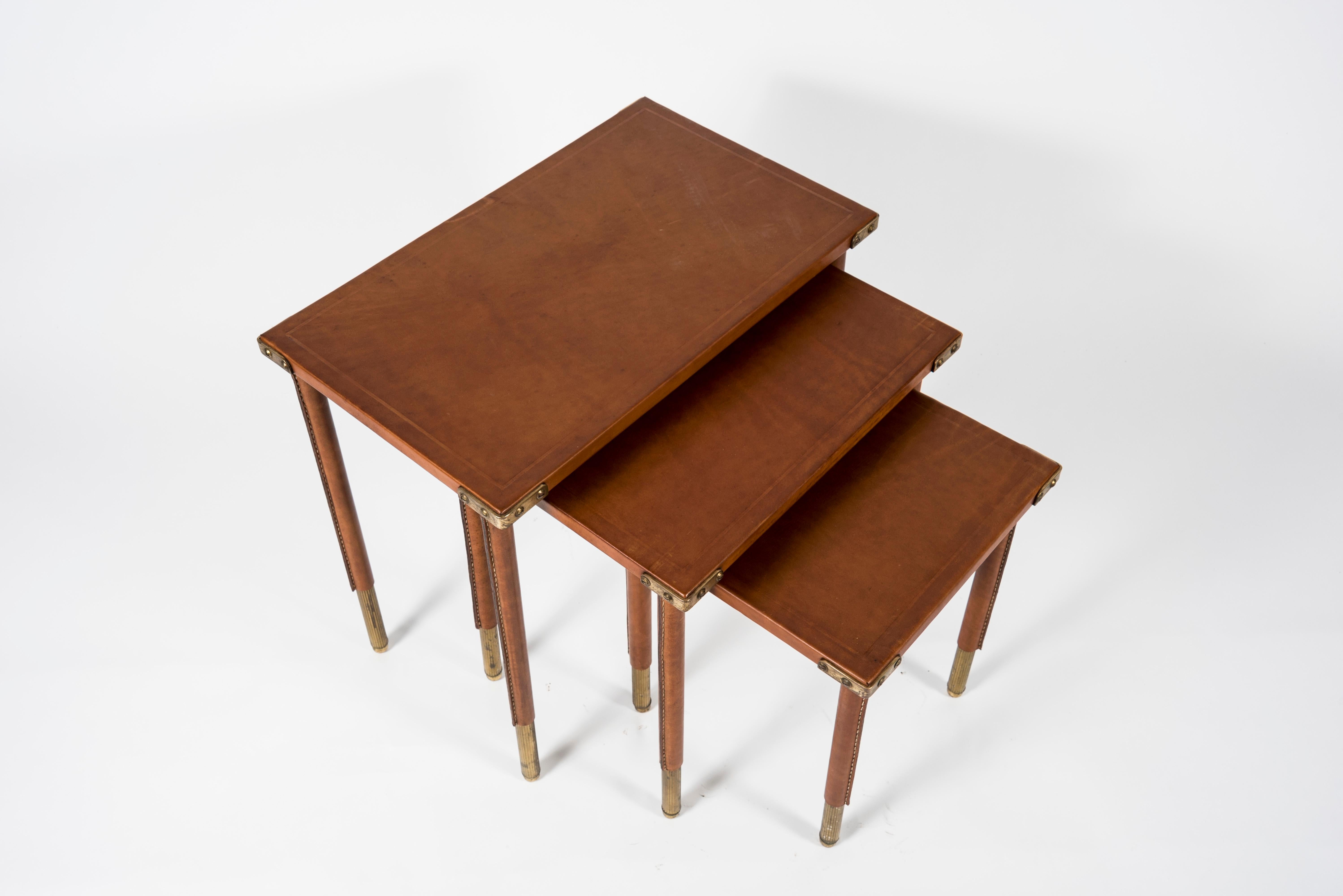 Rare Set of 3 Nesting Tables in Stitched Leather by Jacques Adnet 1