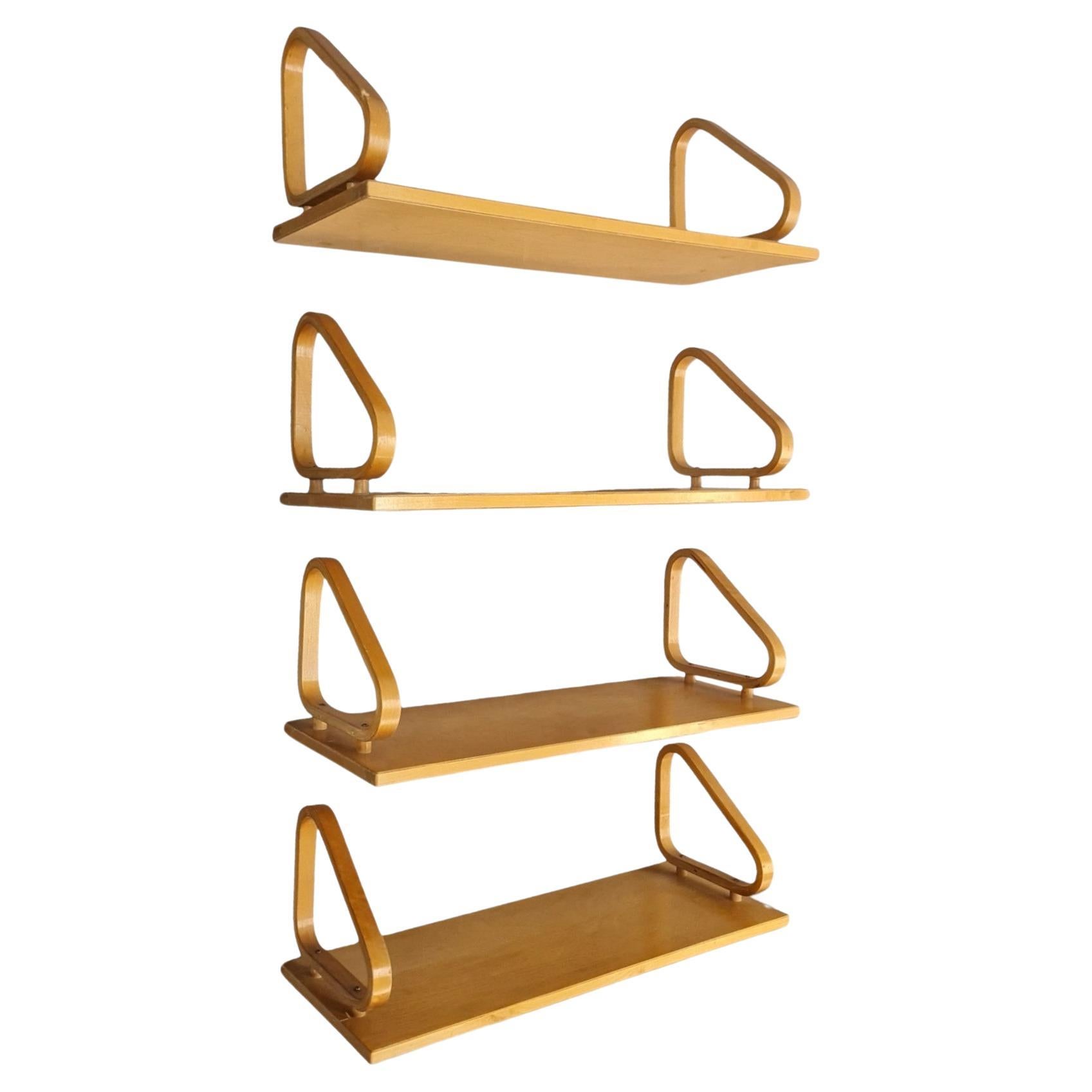 Rare Set of 4 Alvar Aalto Wall Shelves Model 112 with Pegs, 1930s. 