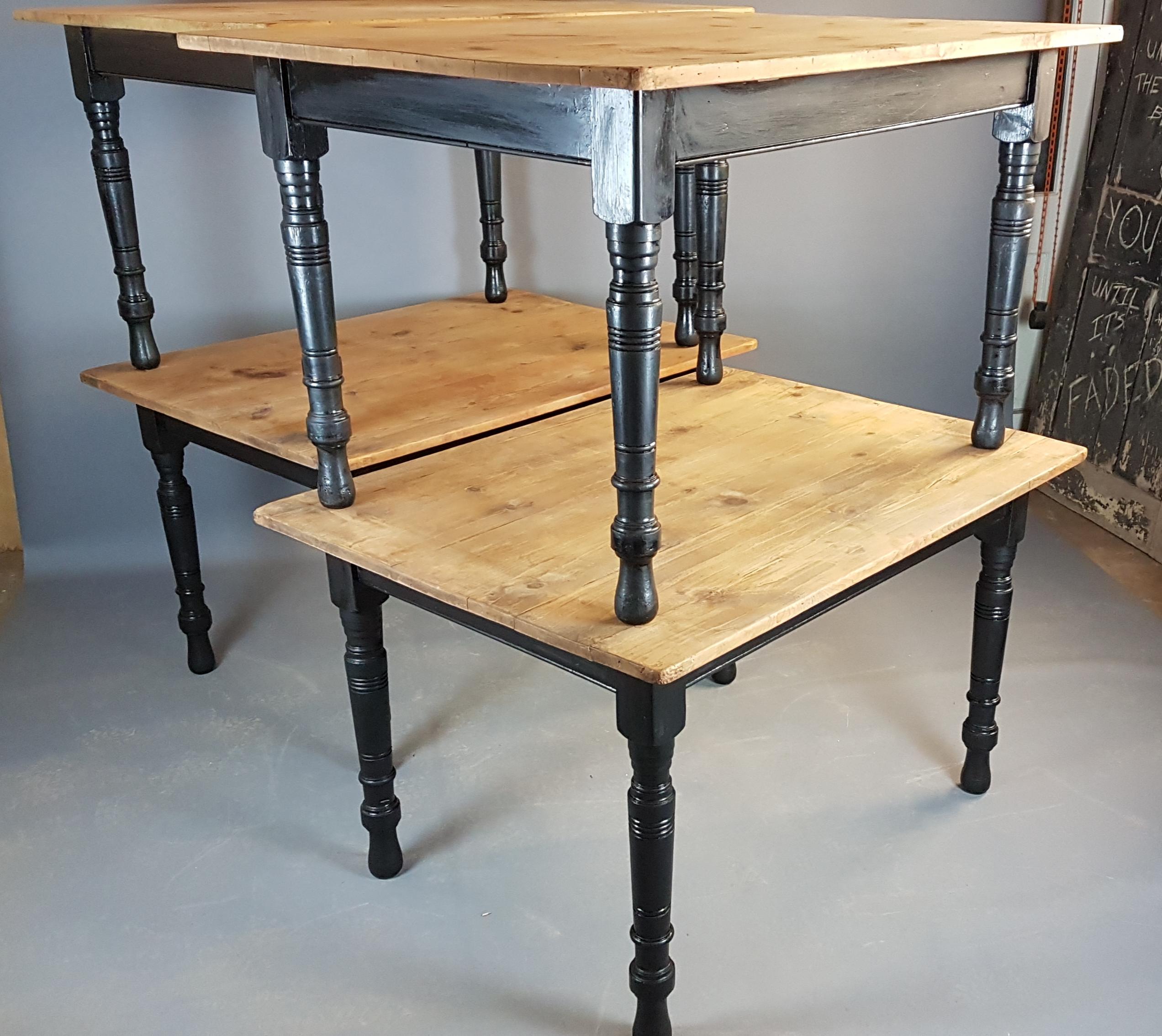 A rare set of 4 early 20th century painted pine tables, each being identical in design and measurement.

They have black painted bases and dry scrub top tops that still retain the original hand planing marks as they were covered for all these