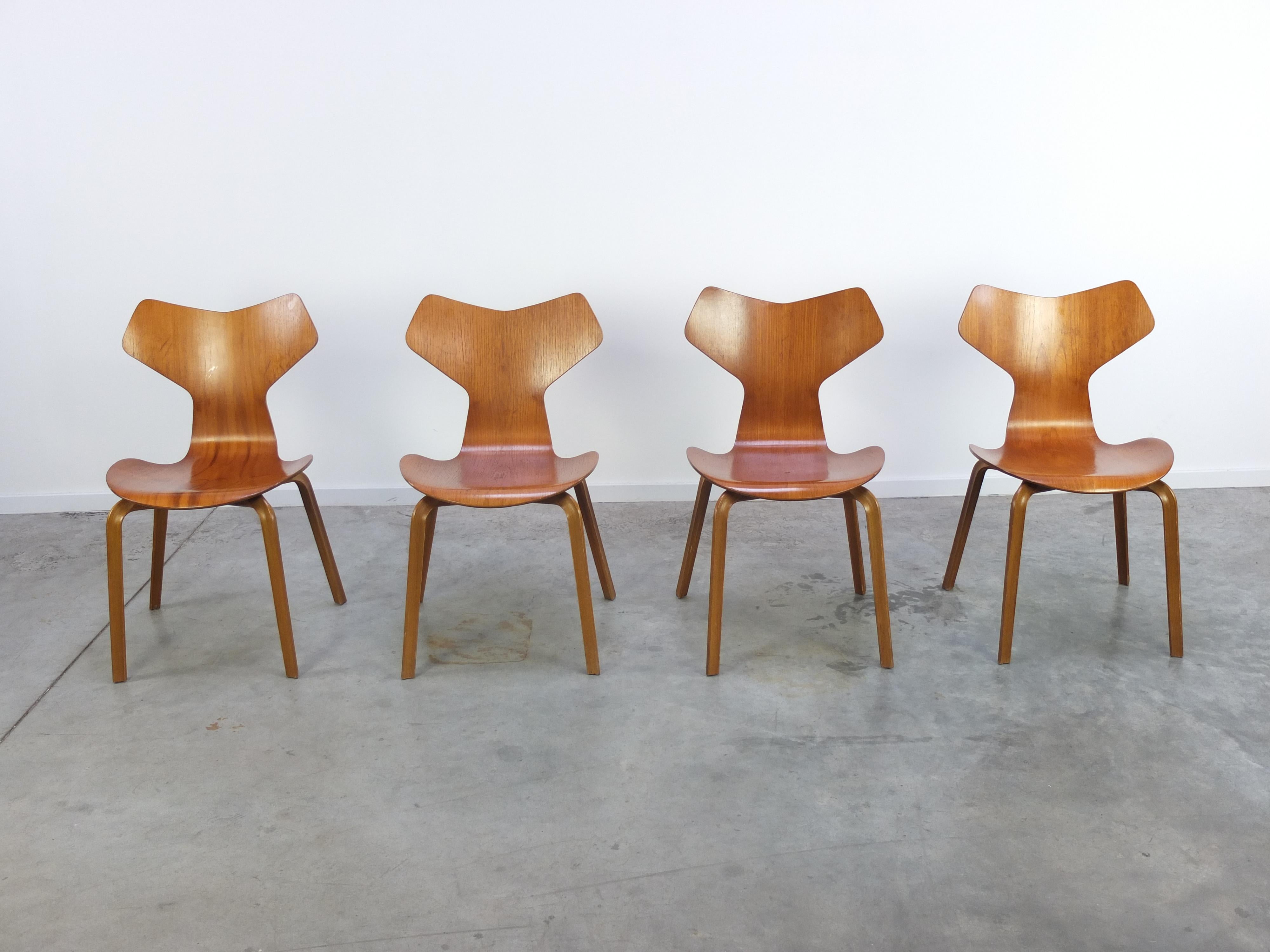 Original set of 4 ‘Grand Prix’ chairs designed by Arne Jacobsen for Fritz Hansen in 1957. Later that year, the chair was displayed at the Triennale in Milan where it received the Grand Prix, the finest distinction of the exhibition. These chairs are