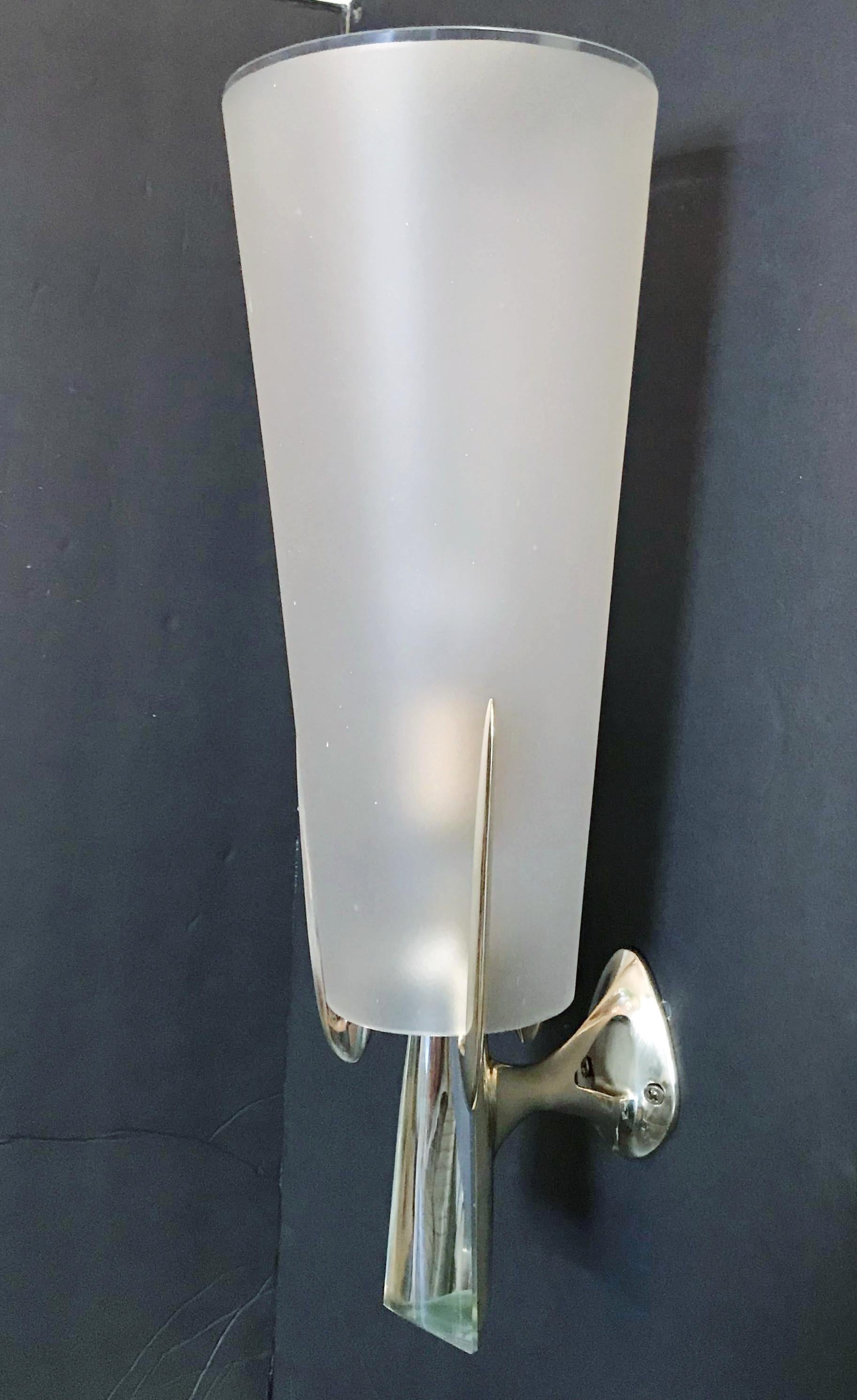 Rare Italian wall lights by Max Ingrand for Fontana Arte, satin beveled glass shades held by polished brass structures with beveled glass crystals / made in Italy in 1959
Measures: Height 18 inches, width 6 inches, depth 6 inches
1-light / standard