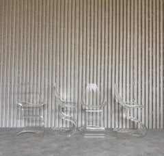 Rare set of 4 sculptural Lucite chairs by Michel Dumas