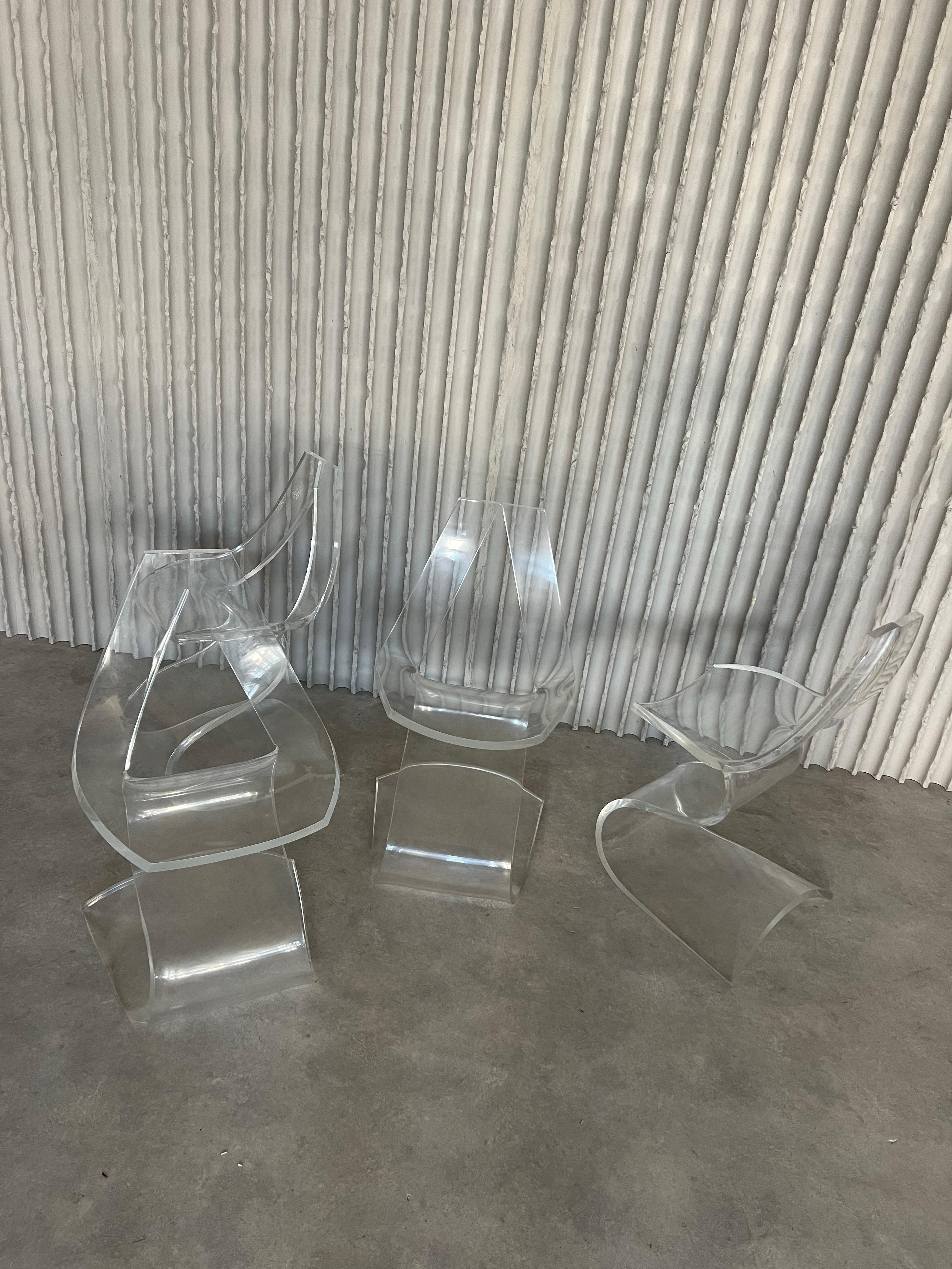 Mid-Century Modern Rare set of 4 sculptural Lucite chairs by Michel Dumas For Sale