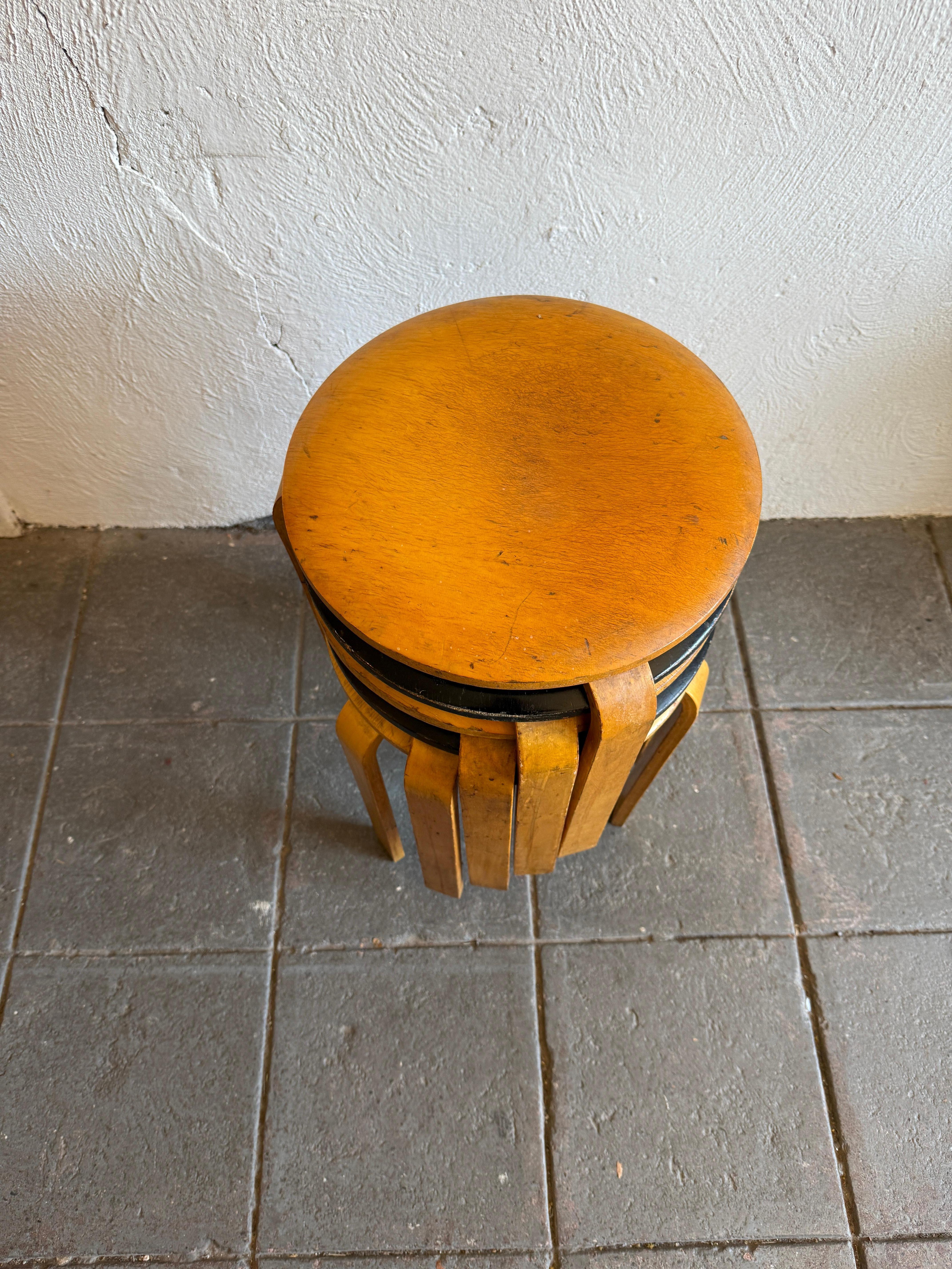 A set of 5 Early Stool #60 designed by Alvar Aalto and produced in Sweden by Artek. During the war period Artek opened factories in neutral Sweden where supplies were still available. What they produced were slight variations on the classic slimmer