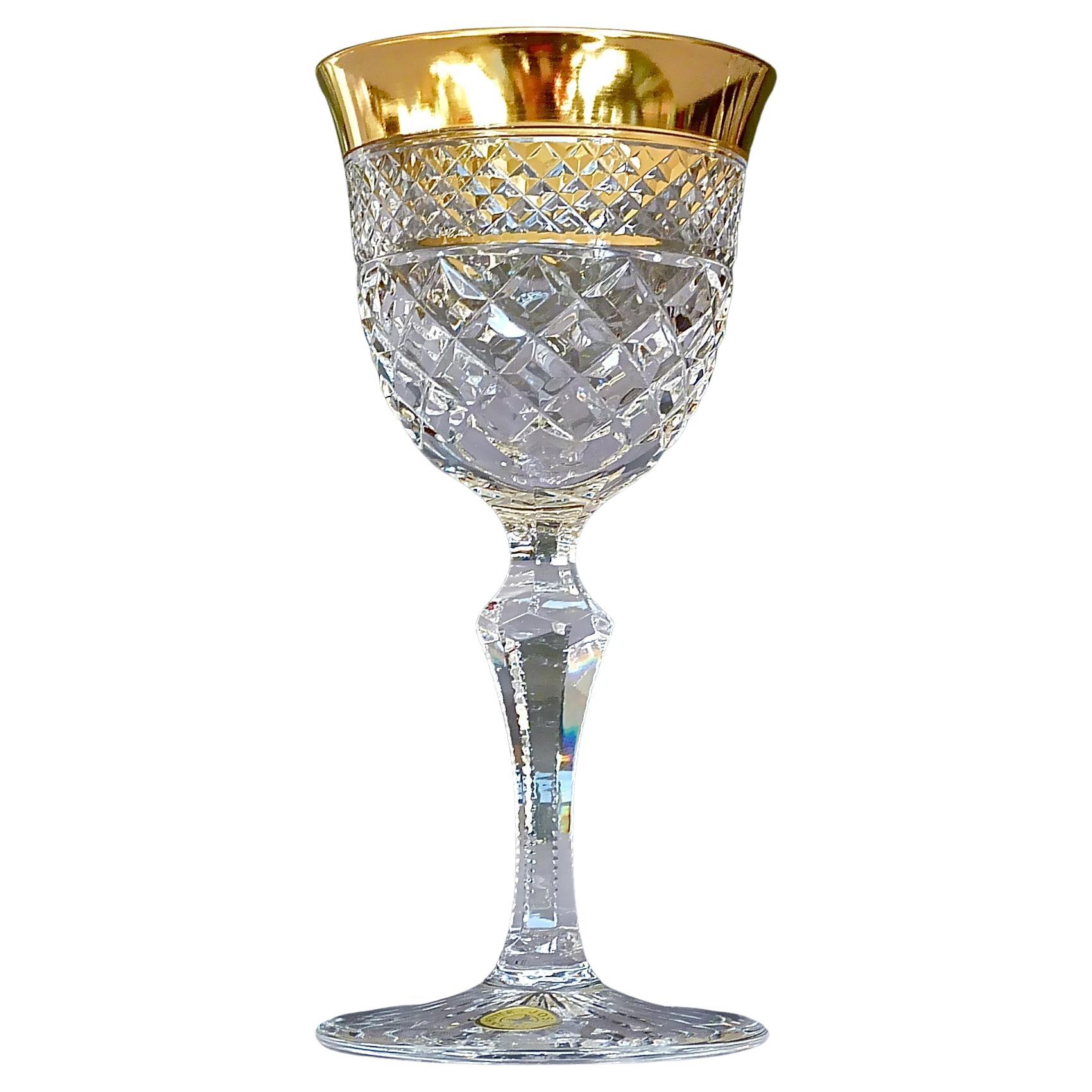 Gorgeous 20th century handcrafted faceted crystal glass set with 24-carat gold rim made by Josephinenhütte Moser circa 1960-1970 and very in the style of the exclusive French company Baccarat or Saint Louis thistle. This exquisite set of 6 dessert