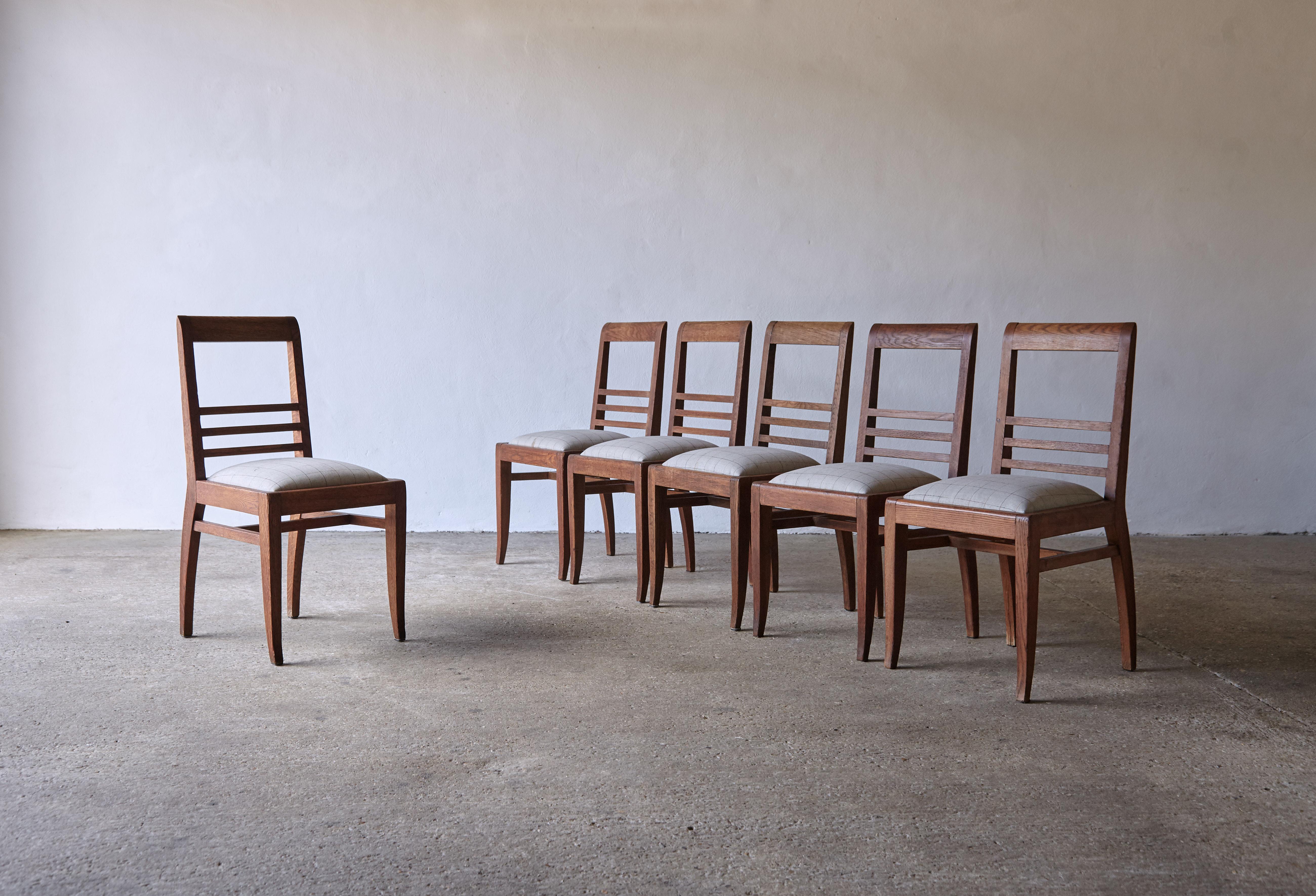 A rare set of 6 original Michel Dufet (Duffet) dining chairs dating from the 1950s. In good original vintage condition, some signs of use and wear to the wood, including minor losses. The seat pads are loose and easy to recover. Fast shipping