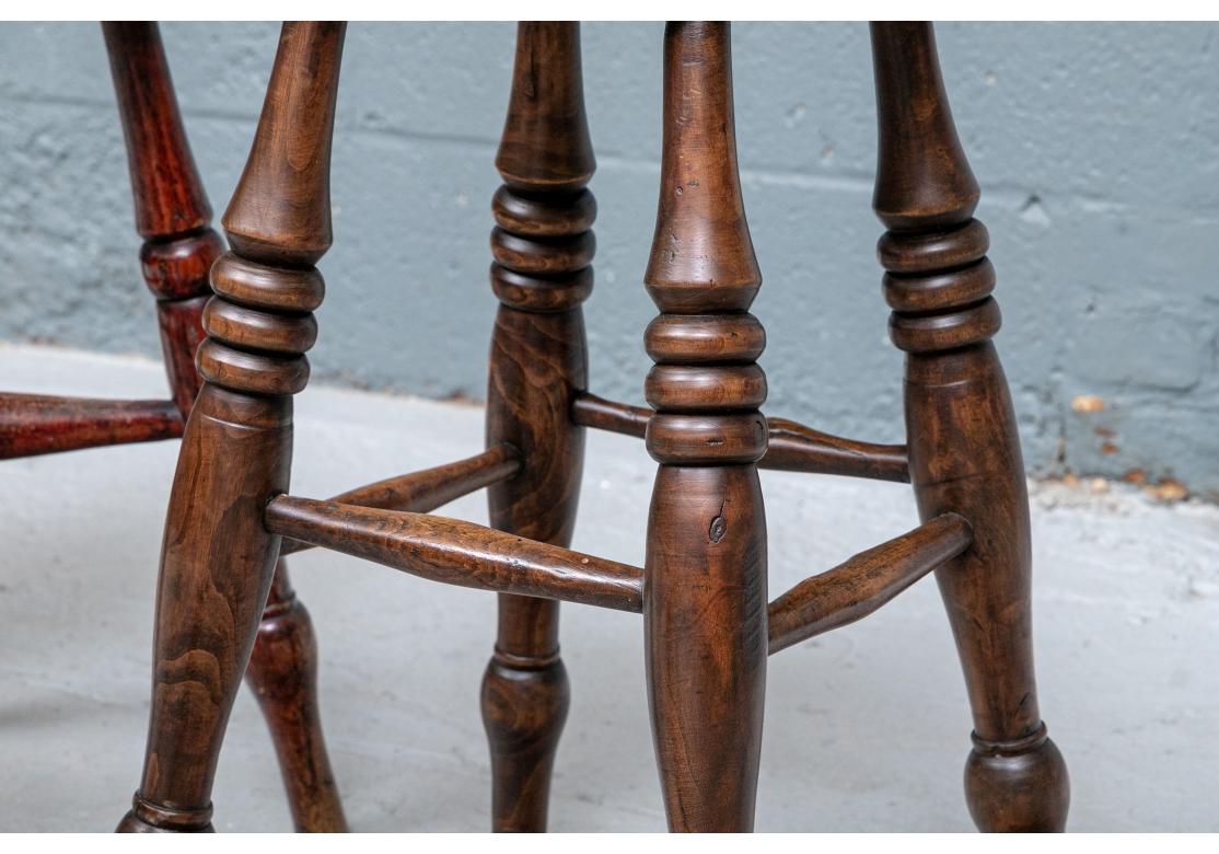 Remarkable group of six time-worn English Tavern Stools with fine and soft age patina. A group of 6 antique compatible tavern stools, each unique and different making for a great collection. The seats and legs are turned with nice old patina.