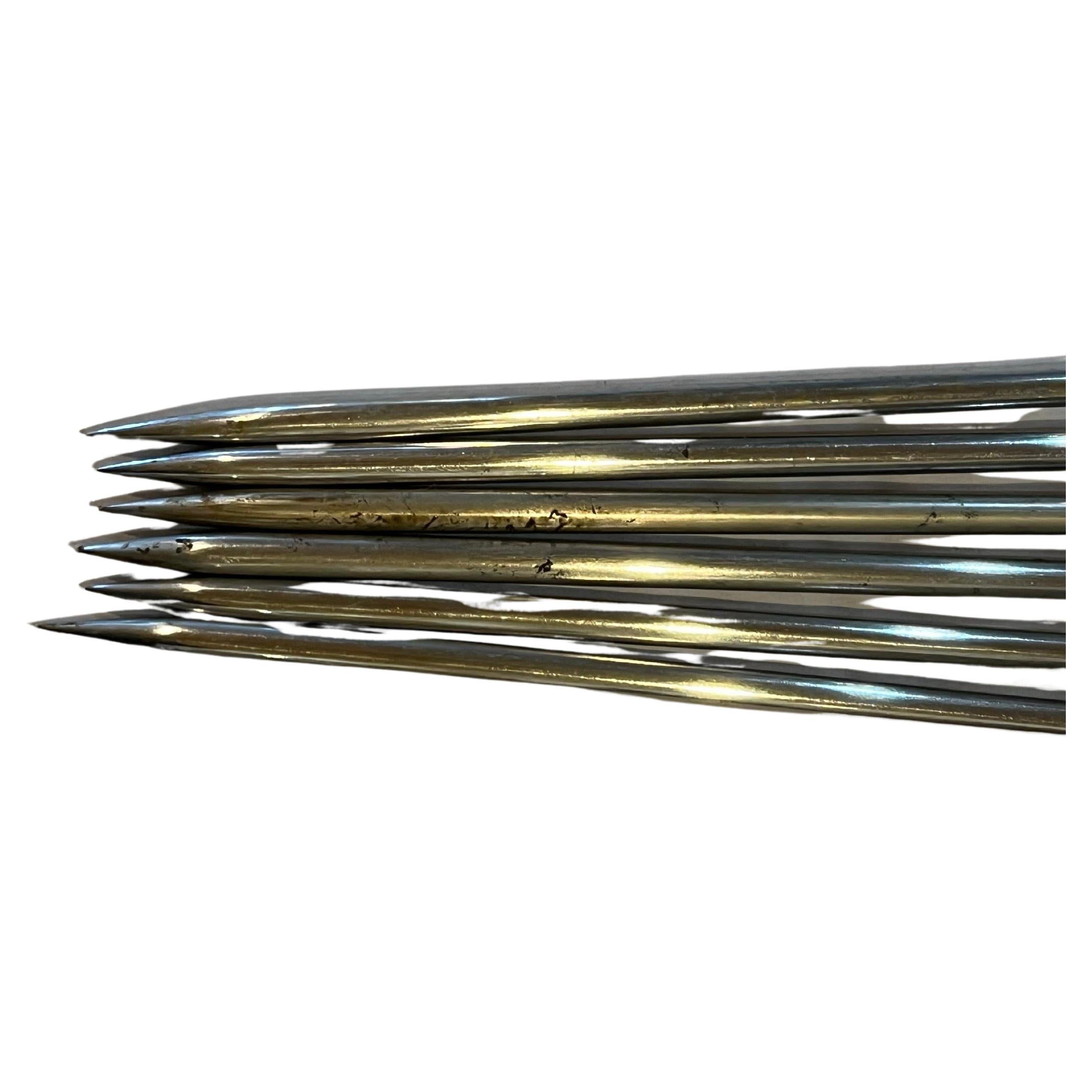 Beautiful quality solid polished steel with rosewood handles and brass connectors , skewers simple elegant design from 1970's 