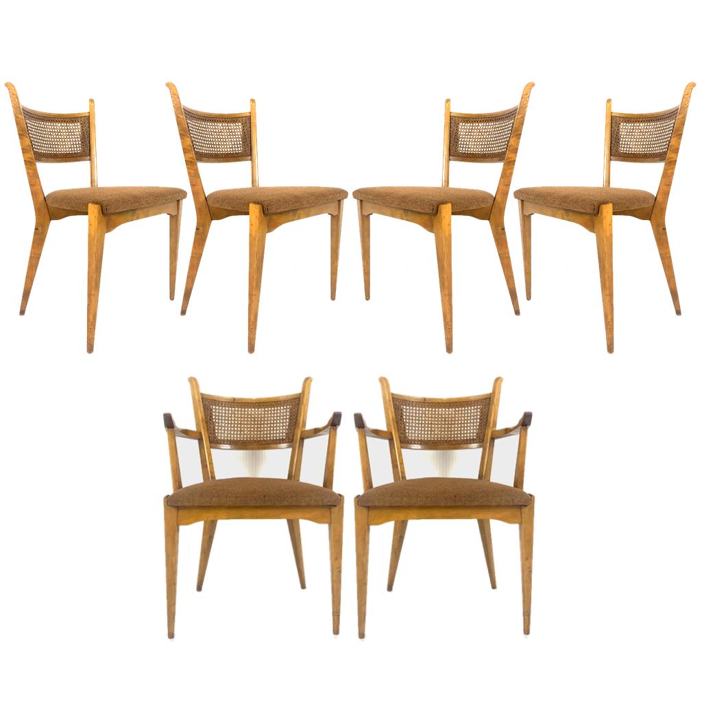 Set of six birch dining chairs by Edmond J. Spence This lovely original set consists of two armchairs and four side chairs. The chairs are in good original condition as shown. Caning is all in good condition as well. Lovely tweed upholstery on the