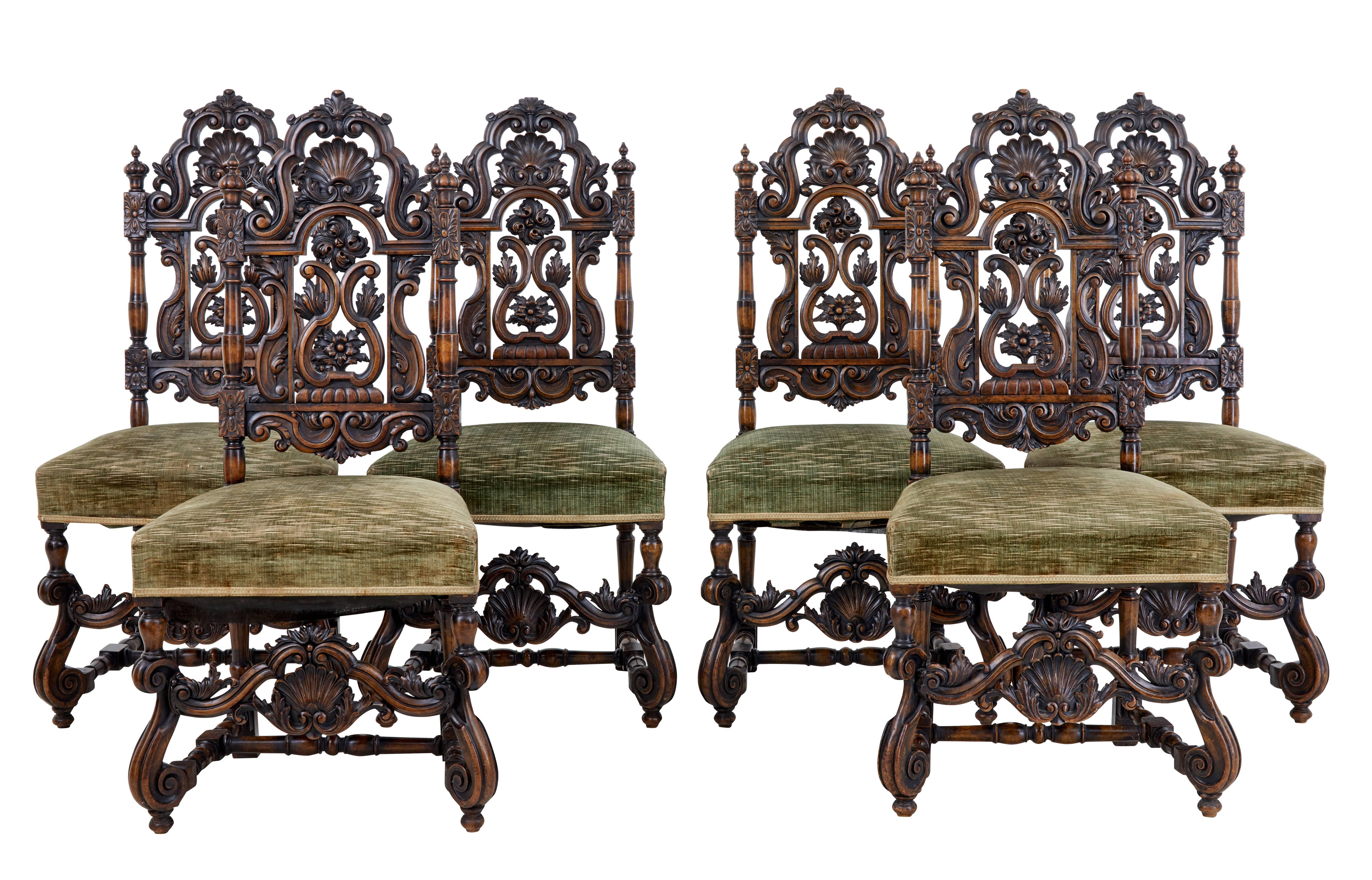 Set comprises of six single and two carver armchairs. Rare to find a set of this quality anymore of good rich color and patina.

Beautifully open carved backs depicting scrolls, foliage, shells and florals. Turned supports run from the top down to
