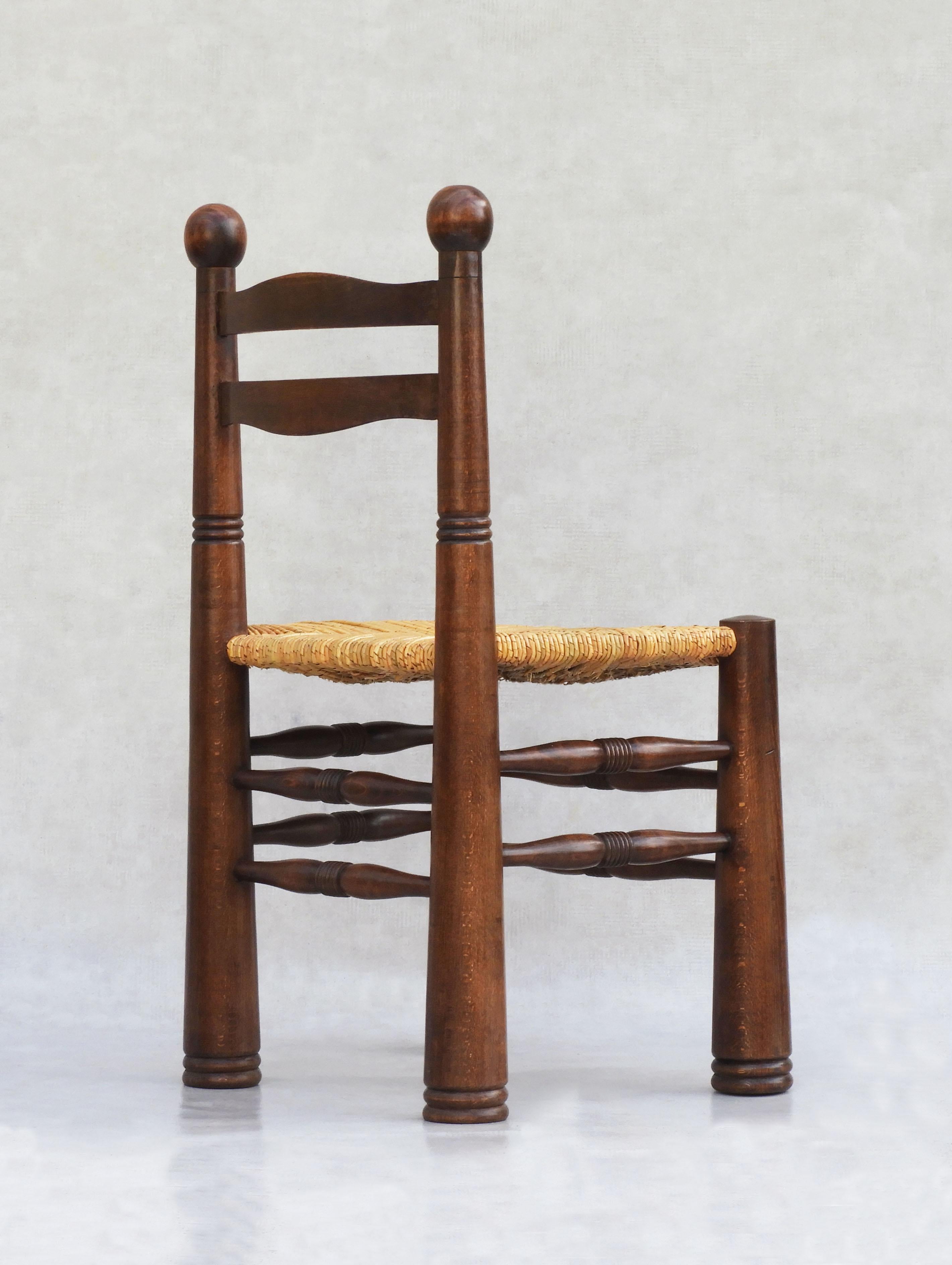 Turned Rare Set of 8 Charles Dudouyt Oak and Rush Dining Chairs C1940
