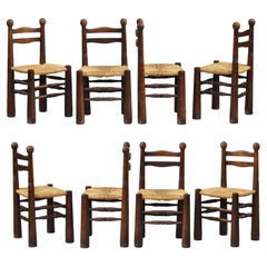 Rare Set of 8 Charles Dudouyt Oak and Rush Dining Chairs C1940