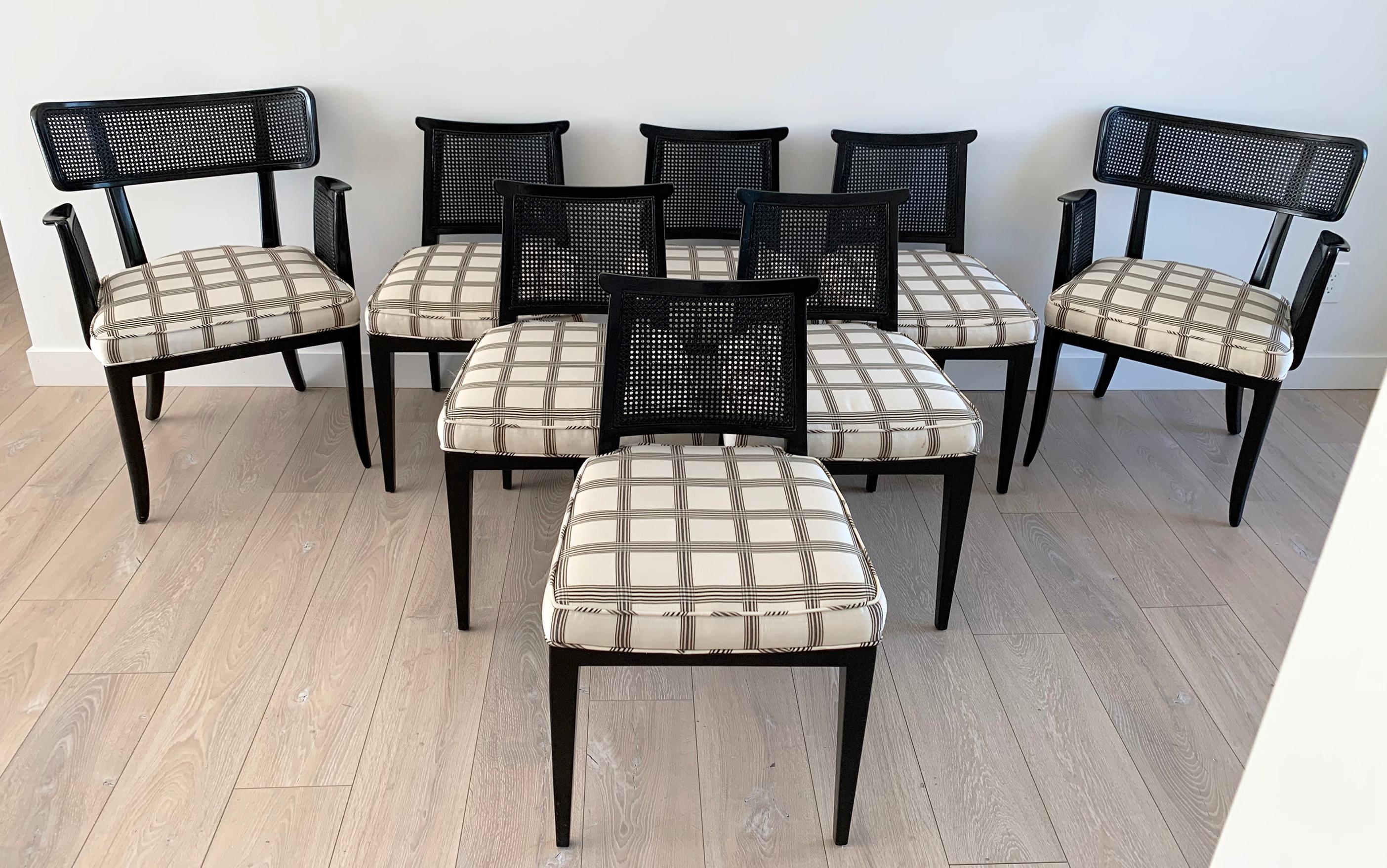 A stunning and increasingly rare set of 8 dining chairs by Edward Wormley for Dunbar. This set of 8 ebonized chairs features 2 model 4580 armchairs and 6 model 4632 side chairs. This incredible set came out of an estate in Beverly Hills from their