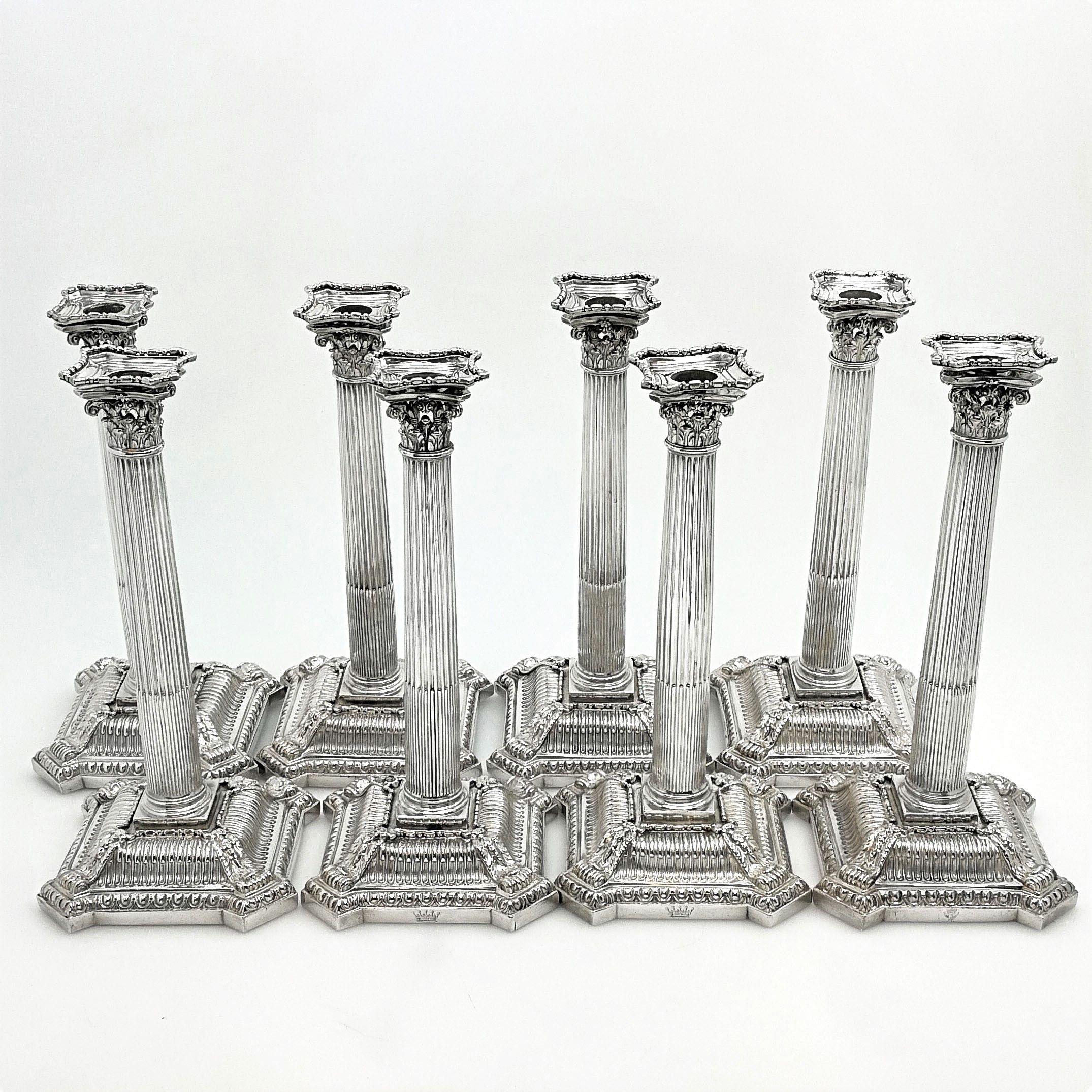 A magnificent set of 8 Antique George II Solid Silver Candlesticks. The Set features a Classic Corinthian column design with removable sconces and shaped ornate bases. 

This set is unusual in its completeness. Although large sets of candlesticks