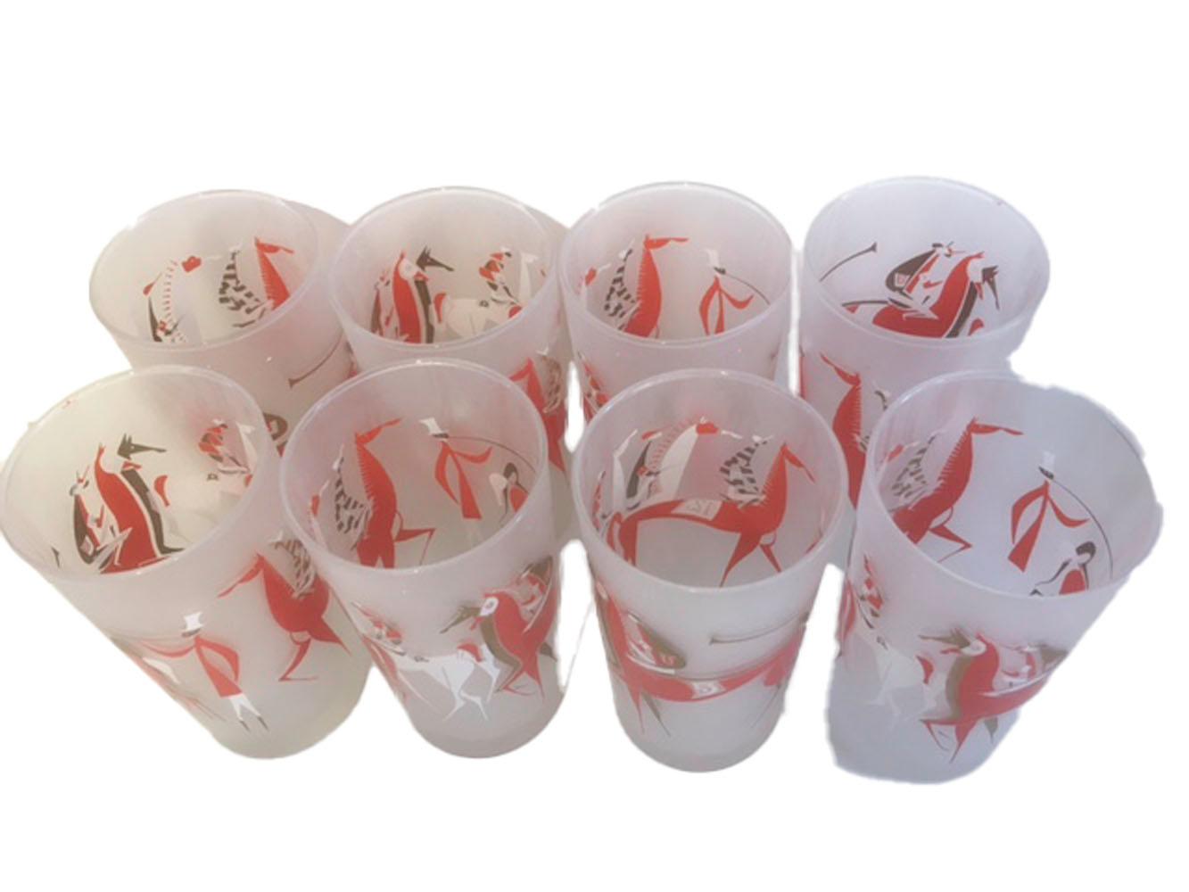 Set of Libbey Glass Co., highball glasses in the Longchamps pattern. Decorated in orange and white enamel with 22k gold on a frosted ground, having stylized race horses and jockeys being announced by a bugler. This set comes with its original