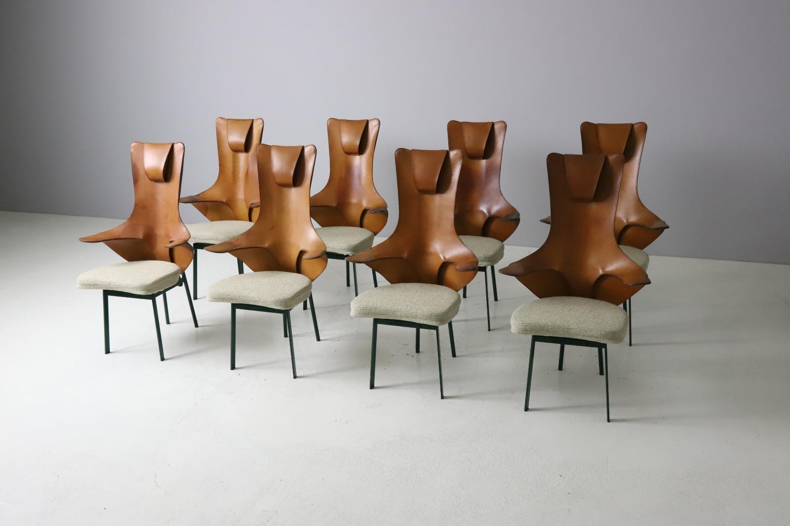 Rare and monumental set of 8 'Regina' dining chairs designed by Paolo Deganello for Zanotta, Italy 1991. 
The chairs feature a lacquered metal structure covered in saddle leather. Over the years the leather obtained a strong and warm patina. The