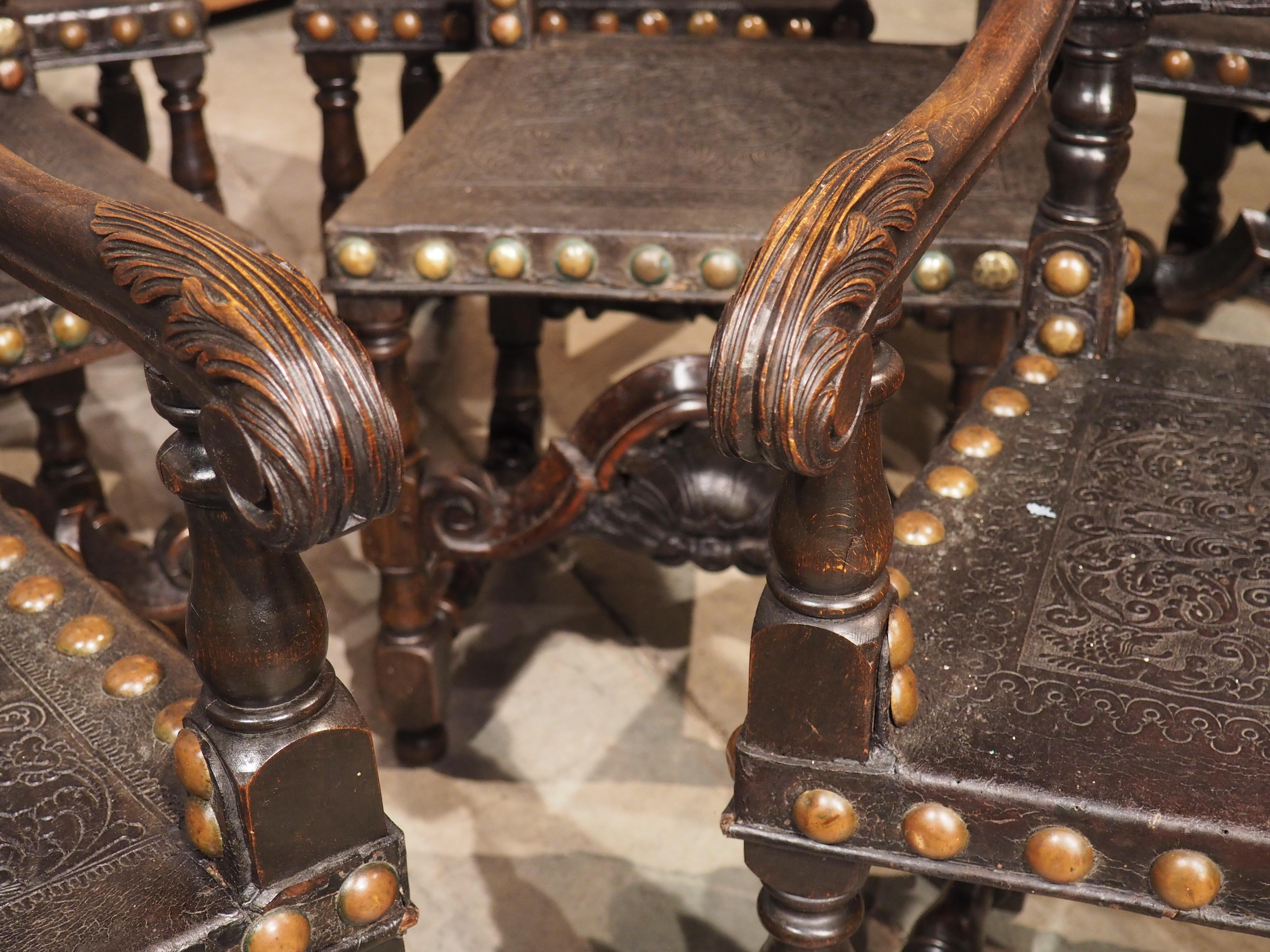 Metal Rare Set of Eight 19th Century Spanish Embossed and Studded Leather Chairs