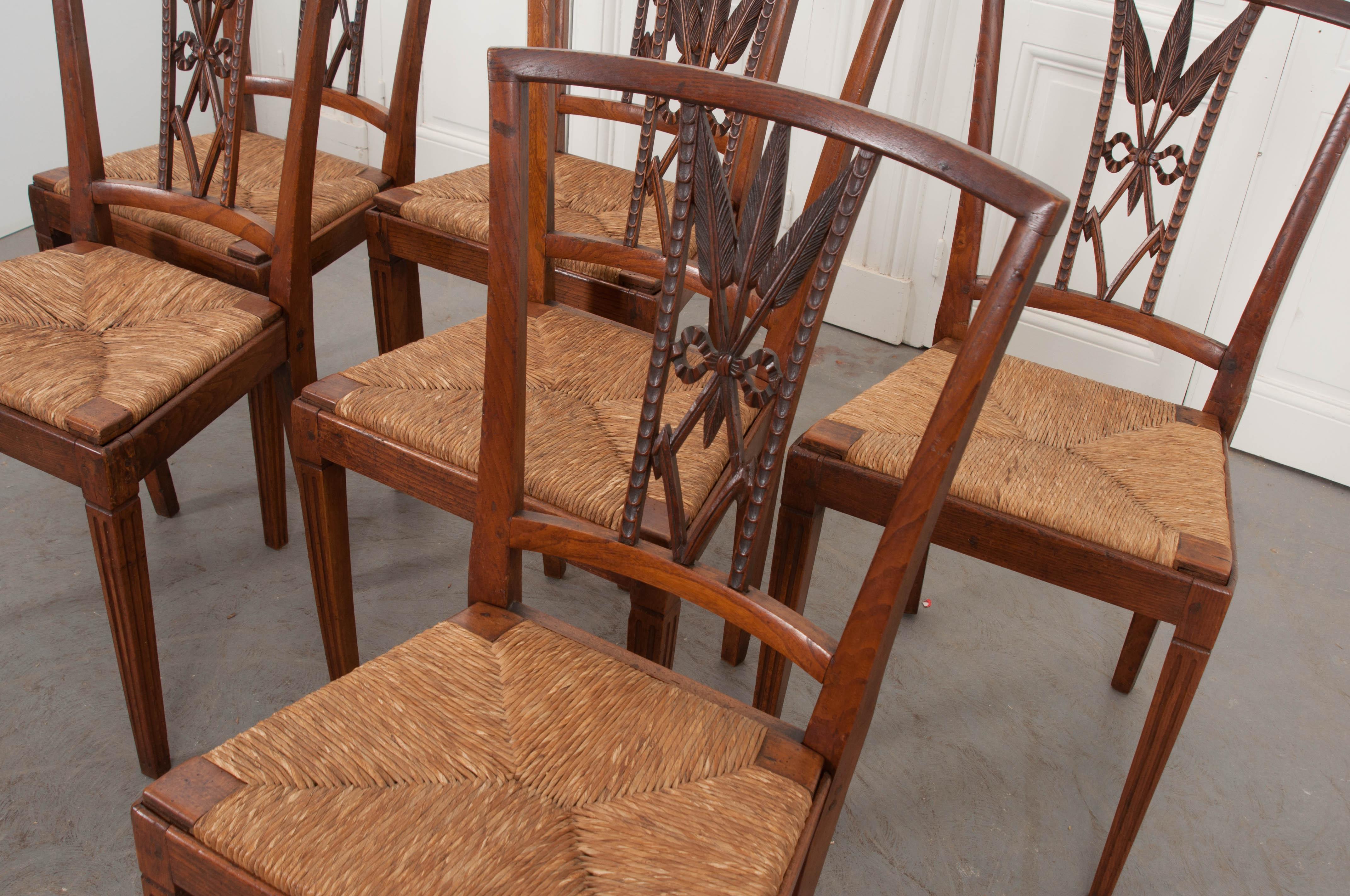 Carved Rare Set of Eight French 19th Century Louis XVI-Style Rush-Seat Dining Chairs