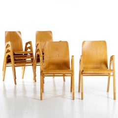 Raro conjunto de ocho sillones almacenables de Axel Larsson