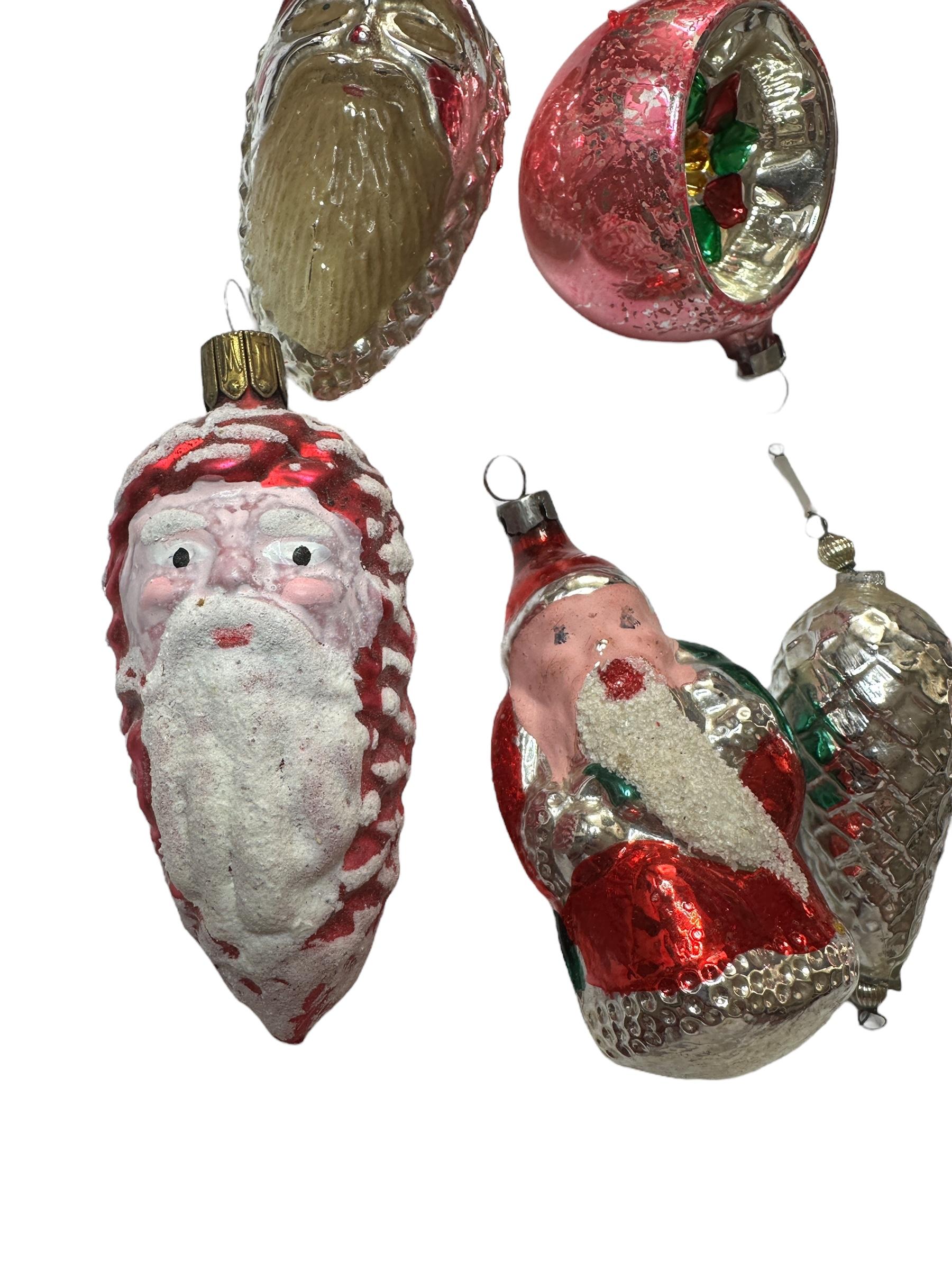 A rare Christmas ornament set from Germany or Austria. Each is made from mouth blown glass, these would be a great addition for your Christmas or feather tree. Size always given for the tallest item in the pictures. Age approx. 1930s to 1940s or