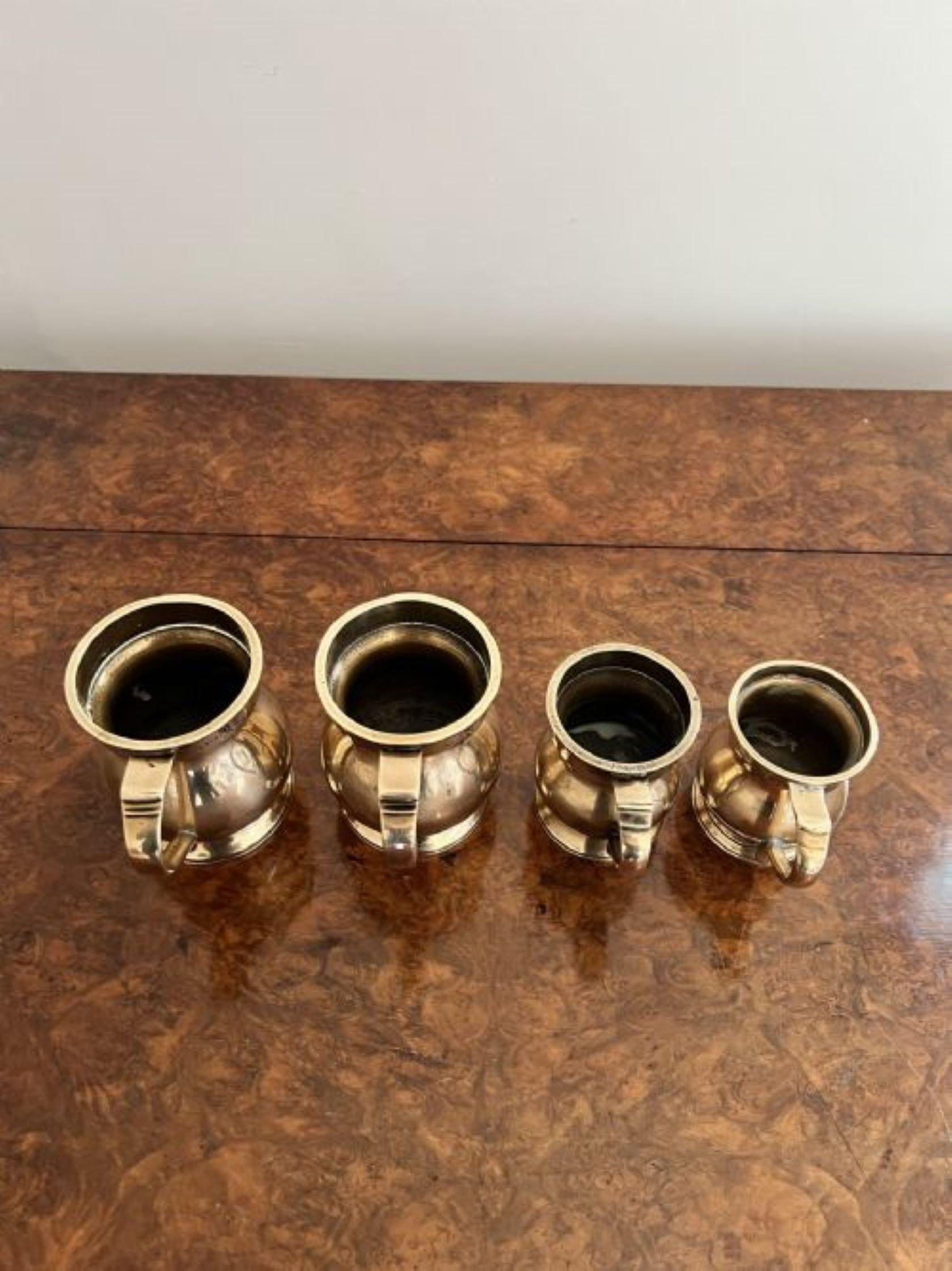 Rare set of four antique Victorian bell shaped tankards having four rare antique Victorian bell shaped tankards, two are engraved with 1/2 pints the other two engraved with 1/4 pints VR, with bell shaped bodies and a handle to the back. 