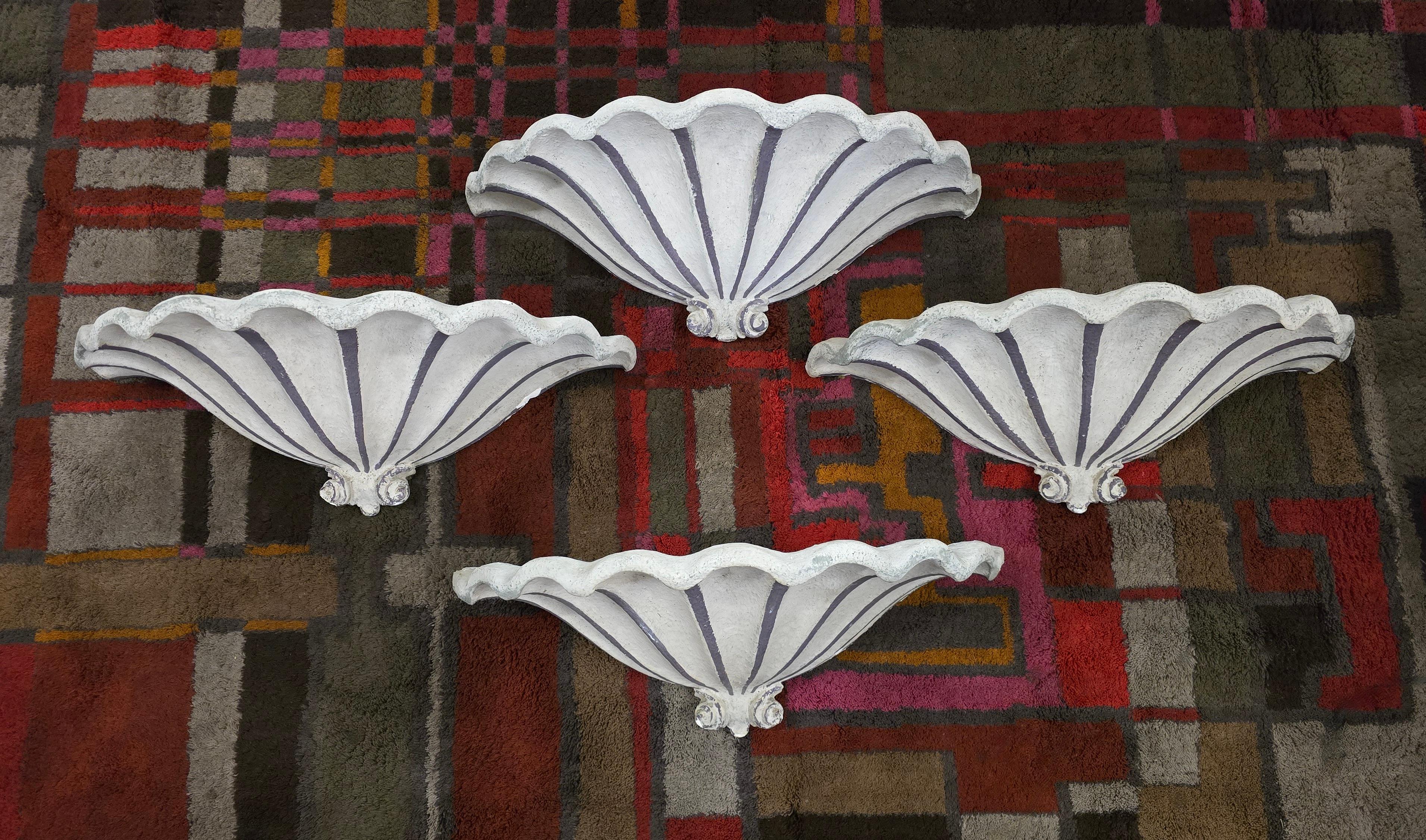 Rare Set of Four Art Deco Wall Ornaments / Wall Sconces – Belgium or France, circa 1920–1950

An exceptional and rare set of four monumental wall ornaments, originally designed as wall sconces. Crafted from plaster with internal straw reinforcement