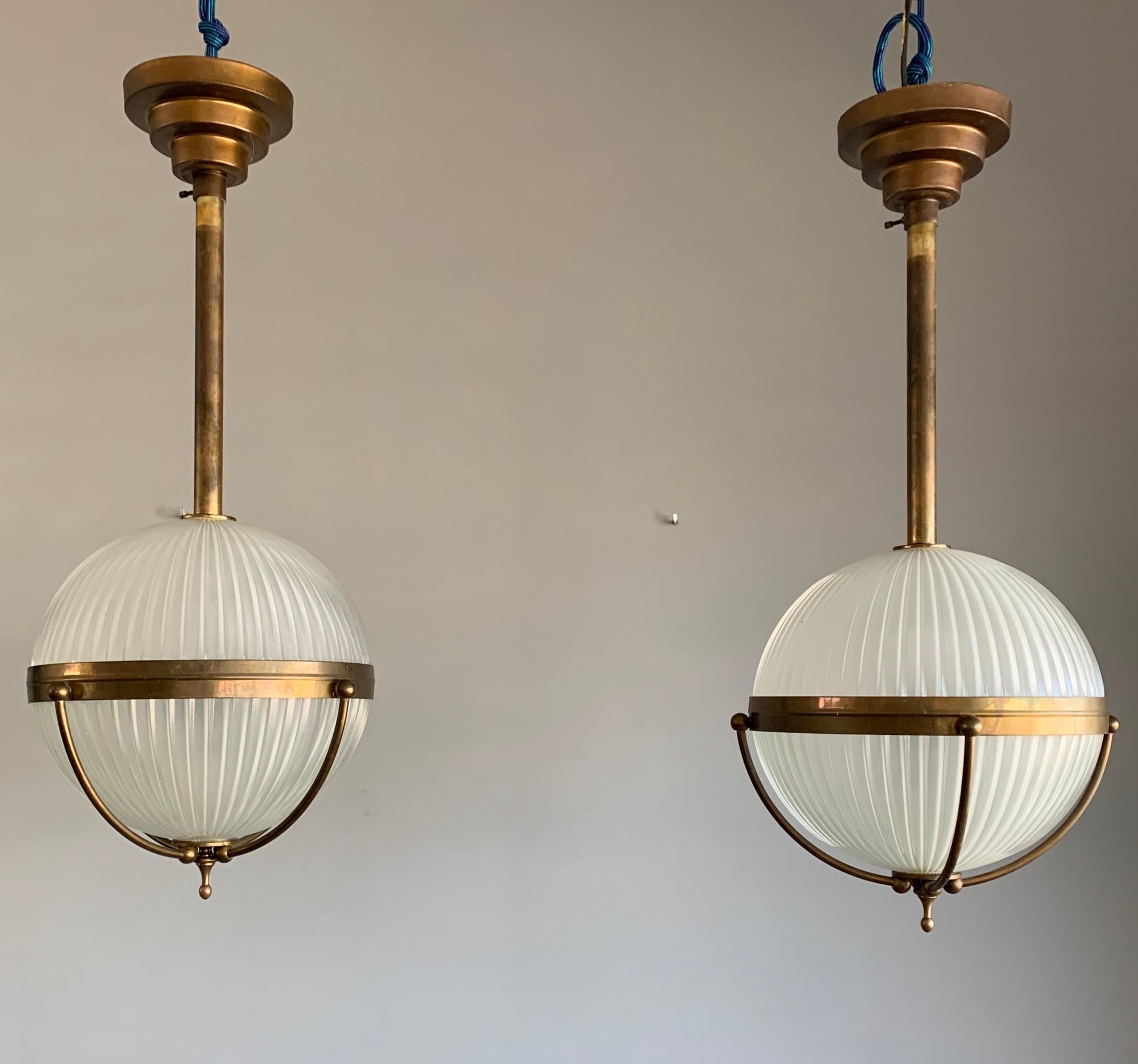 European Rare Set of Four Art Deco Style Brass and Glass Holophane Style Pendant  Lights 