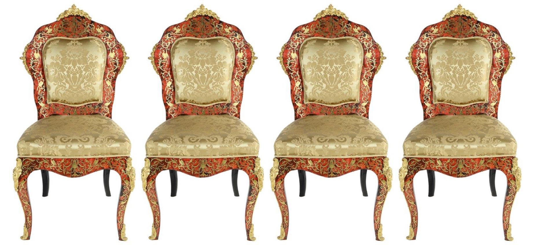 A rare and unusual set of four 19th century French Boulle tortoiseshell and brass inlaid side chairs, each with gilded ormolu mounts, the inlay depicting foliate scrolls and exotic birds. Upholstered back and seats in yellow damask silk. Raised on
