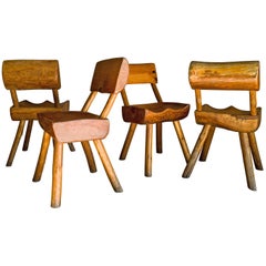 Primitive Set of Four Carved Pine Chairs, circa 1960