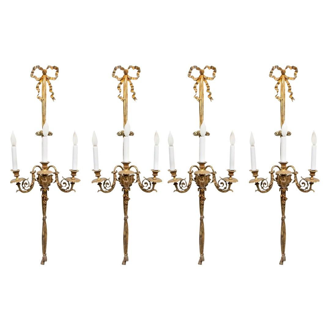 Extraordinary Set of Four Classic French Bow Bronze Sconces