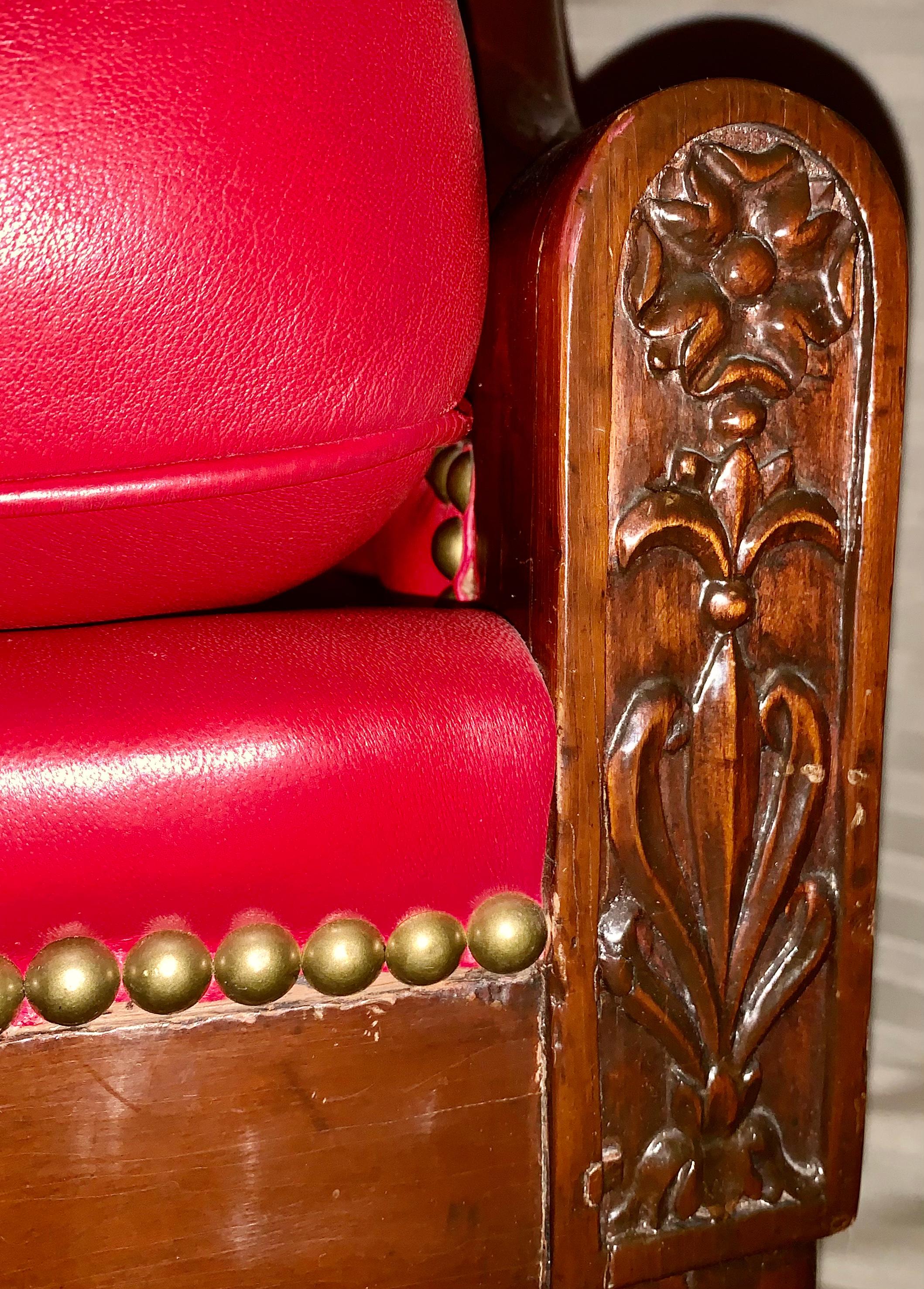 XIXe siècle Rare ensemble de quatre fauteuils Bergères en acajou sculpté à tête de bélier de style Empire en vente