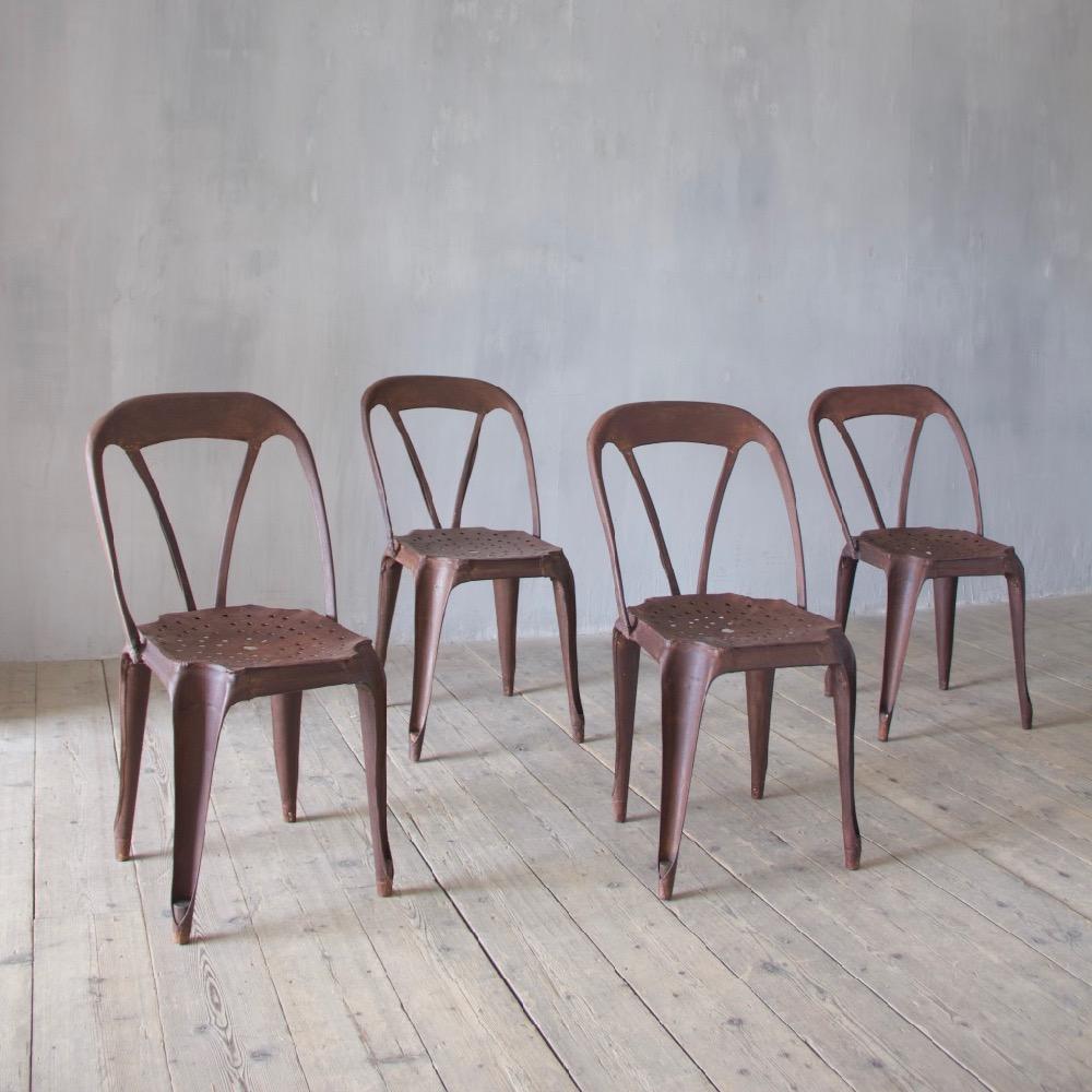 A rare set of four Fibrocit chairs. Lots of old mends but in solid condition, Belgium, circa 1940.