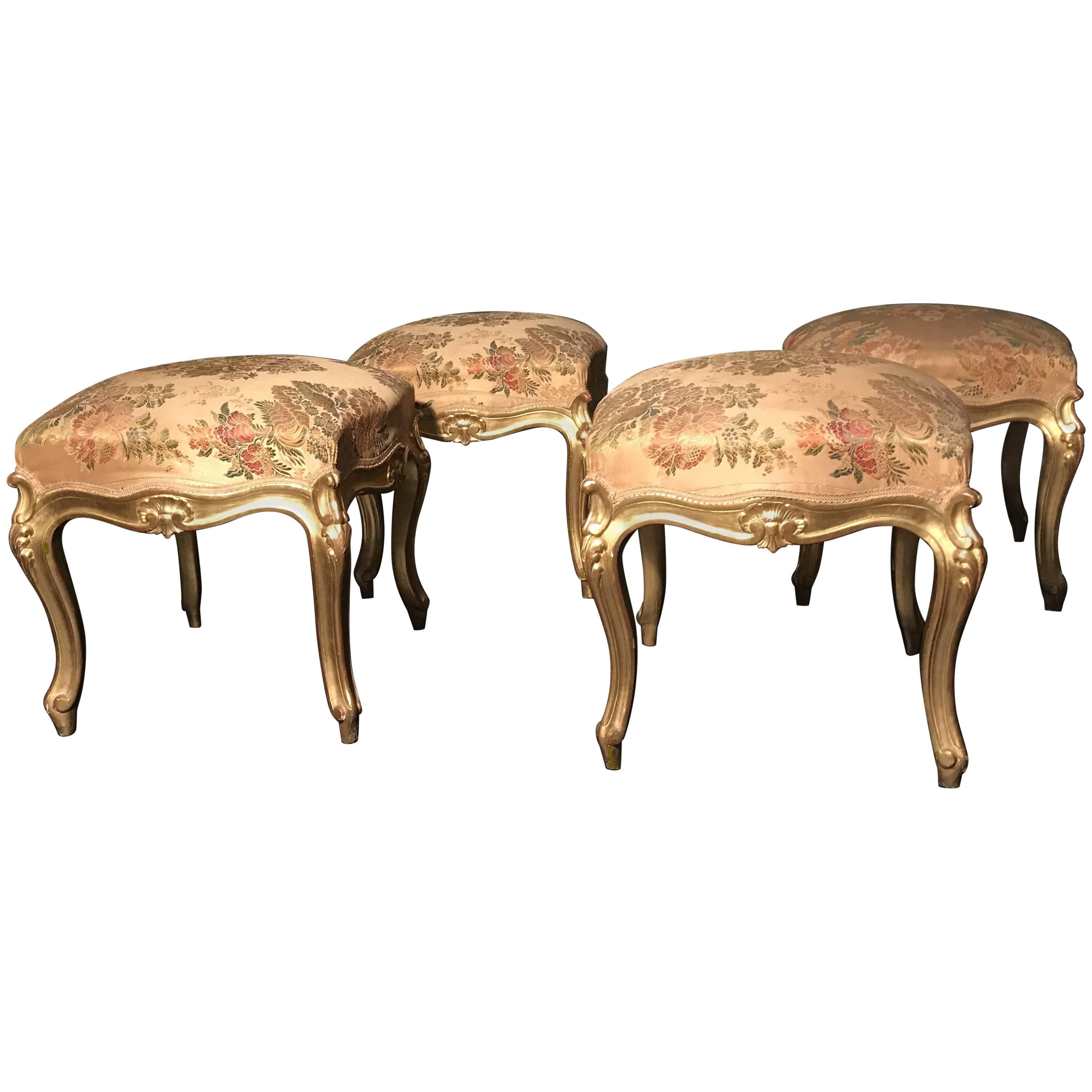 These finely carved and gilded square stools add a beautiful touch to your living spaces. They are carved on all four sides with elegant cabriole legs. Excellent condition of gilding.
This set is part of an eleven piece s salon set published